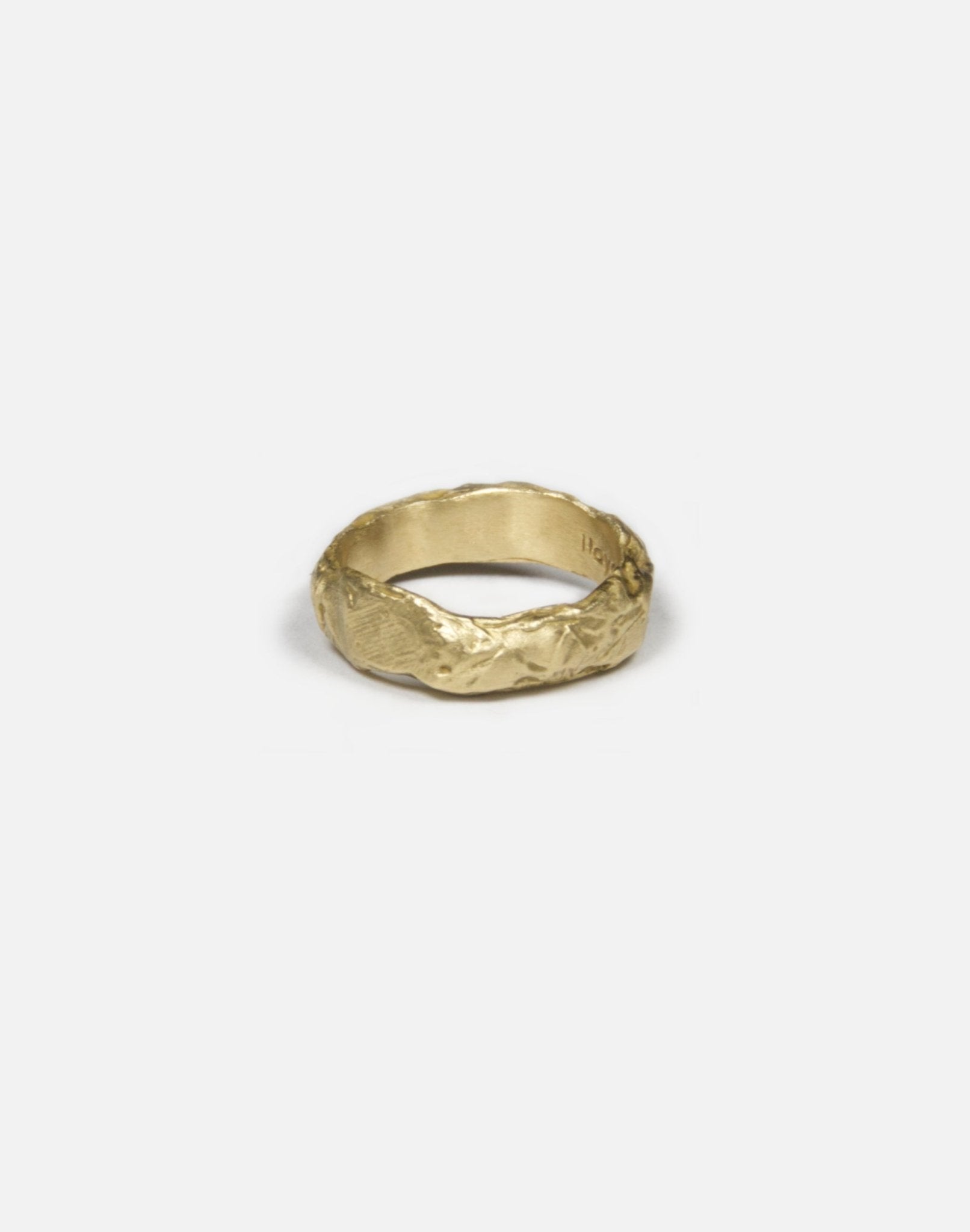 brass textured molten ring band made in new york magma by llayers