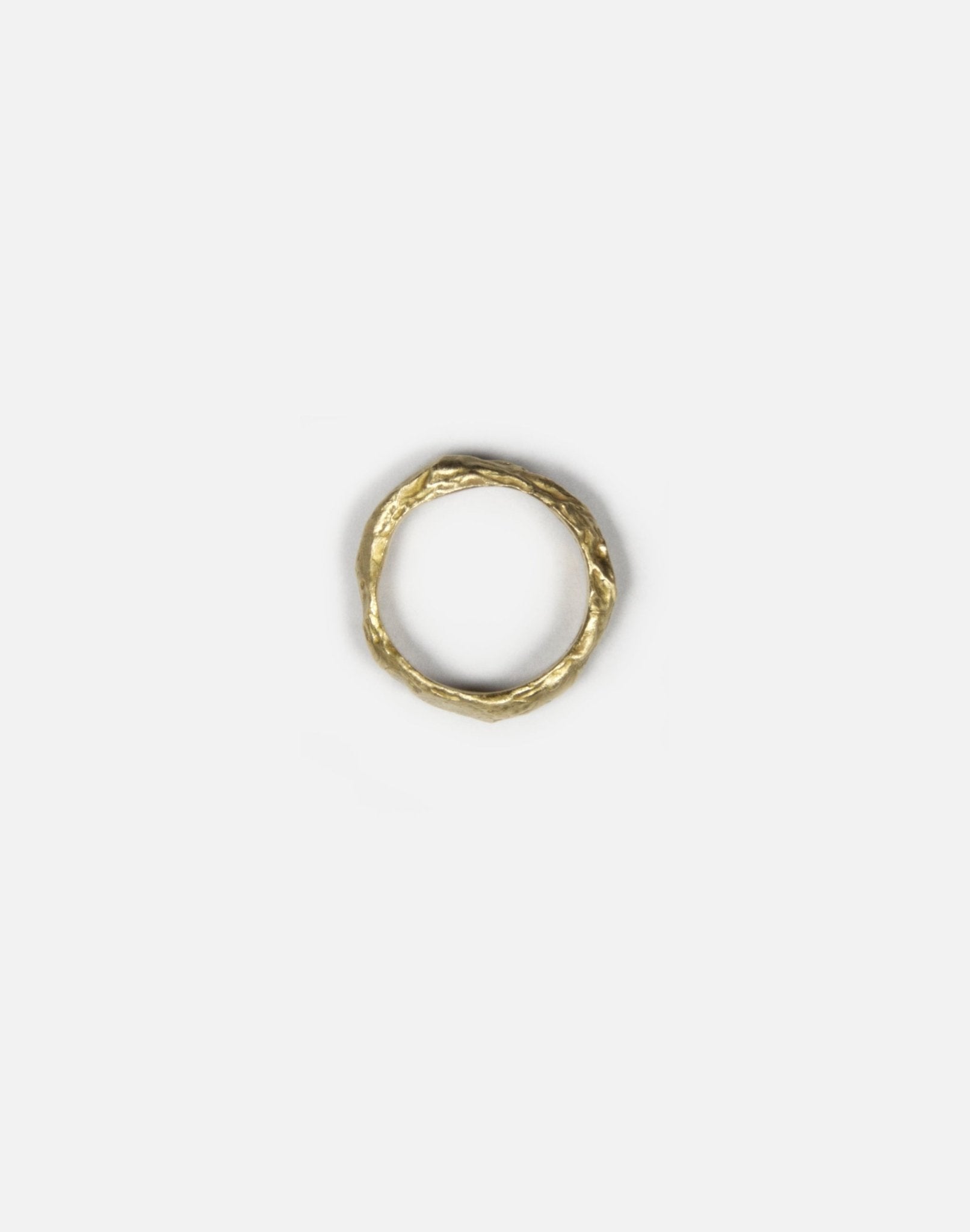 gold brass textured molten ring band made in new york magma by llayers