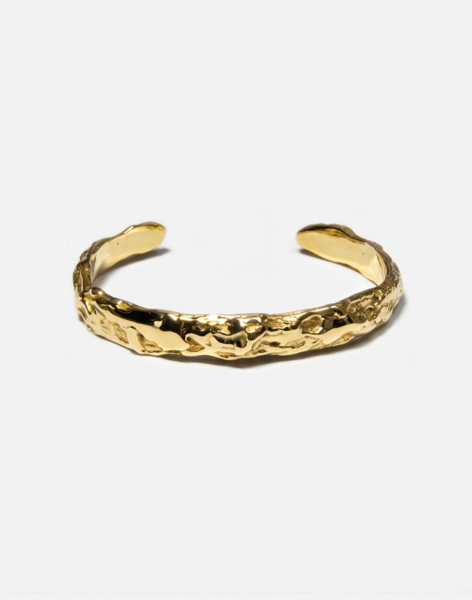 minimal gold plated sculptural molten cuff bracelet in New York