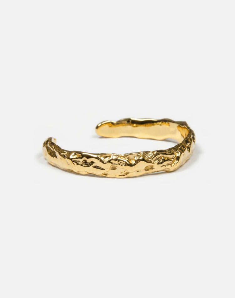 refined gold plated sculptural molten cuff bracelet in New York
