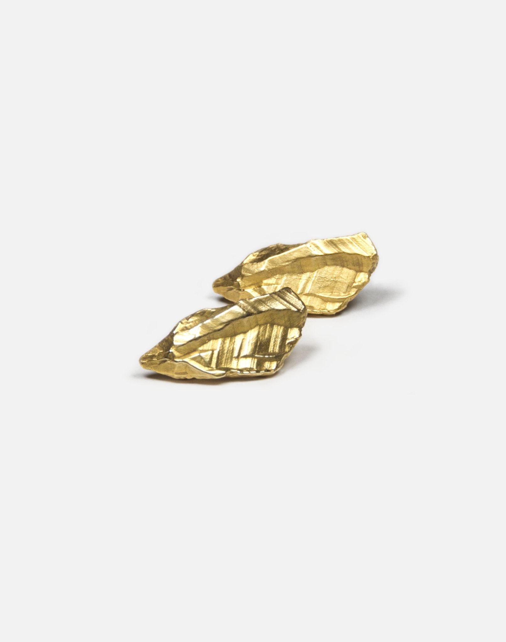 Gold plated sculptural stud earrings. Layers rock formations.Made in new york by llayers.