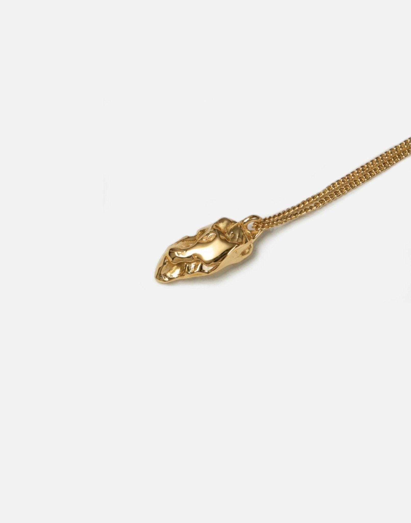 gold sculptural rock pendant necklace in new york by llayers 