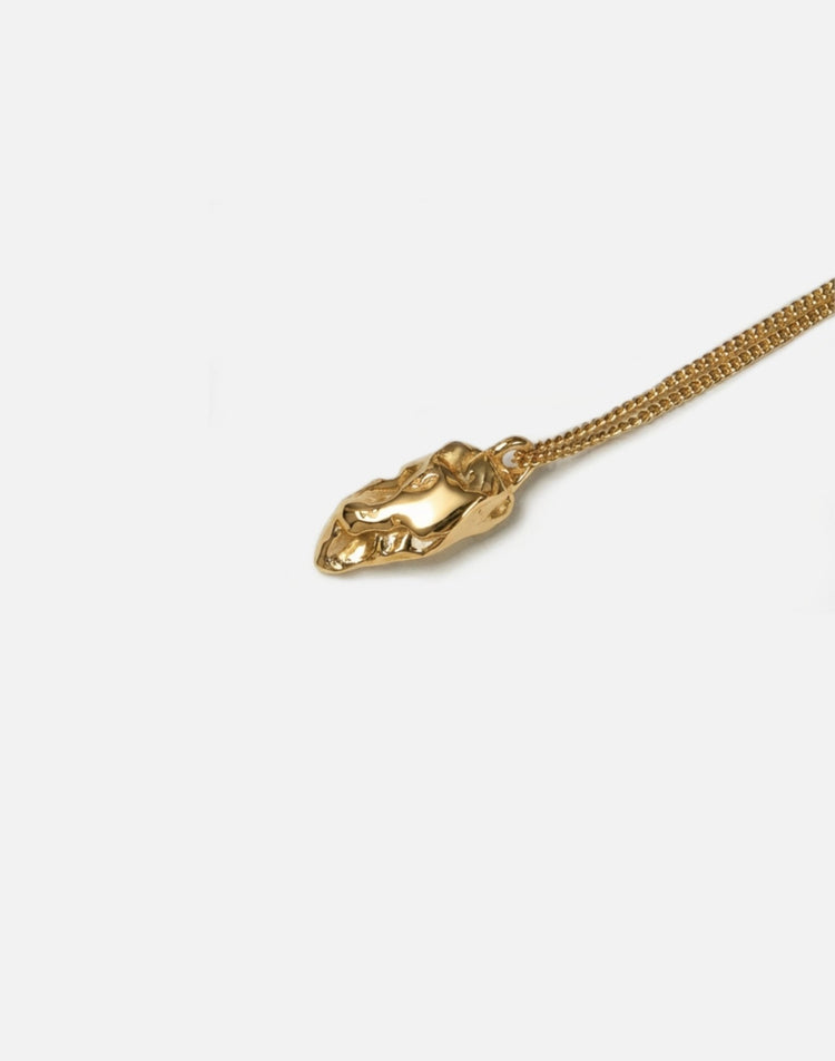 gold sculptural rock pendant necklace in new york by llayers 