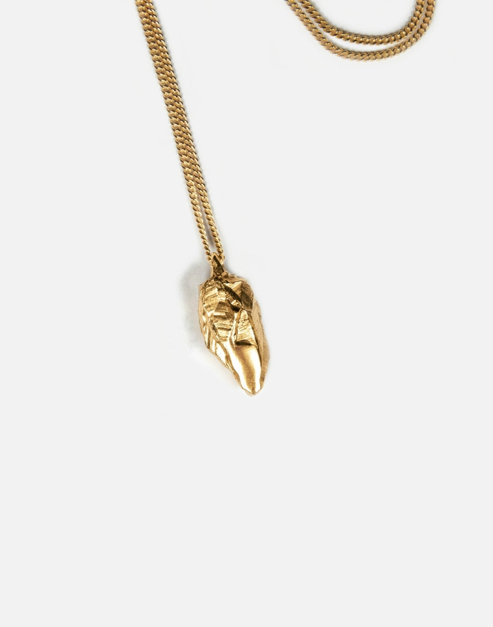gold sculptural rock pendant necklace in new york by llayers 