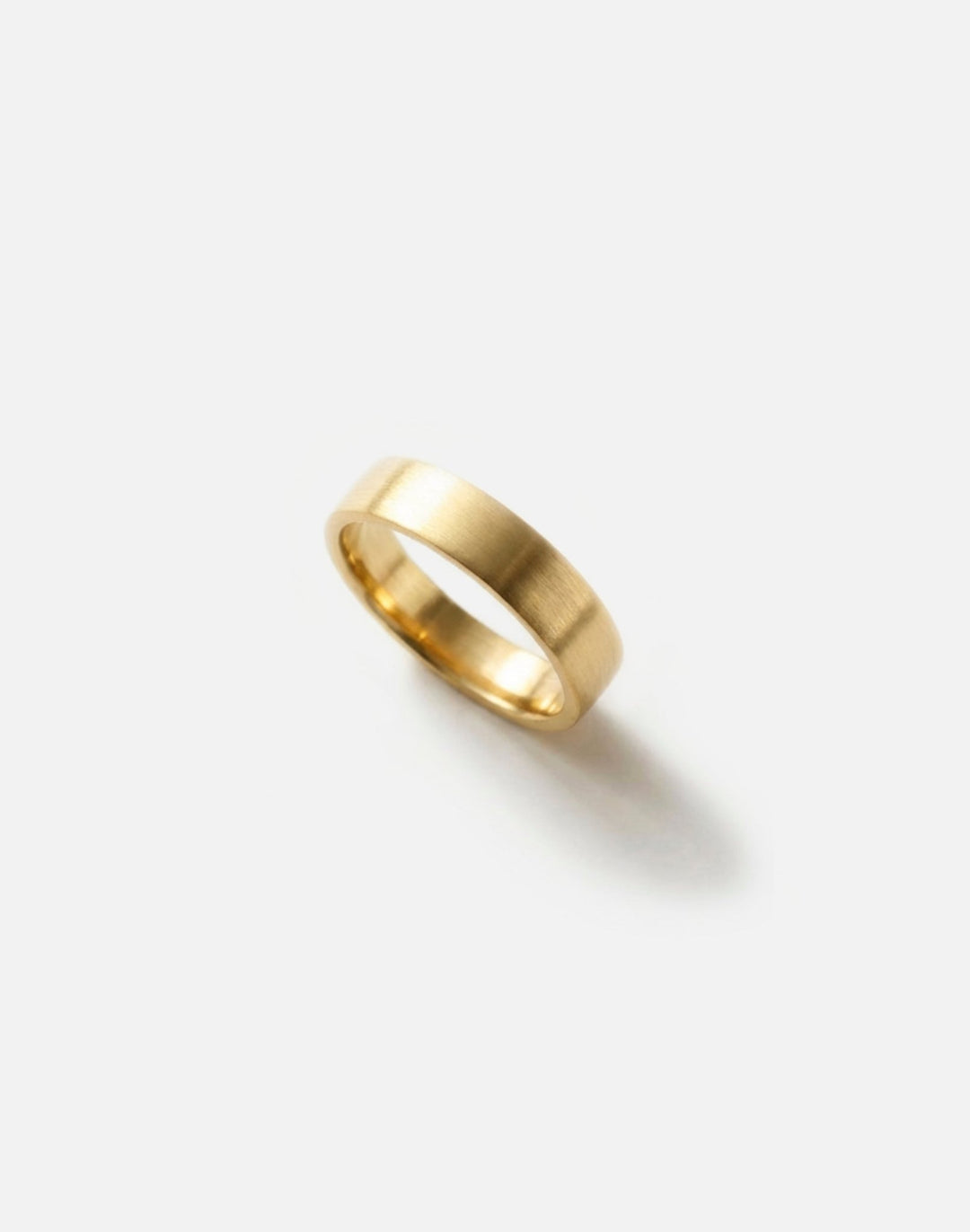 Gold round ring band. Unisex modern minimalist jewelry made in Brooklyn New York by llayers.