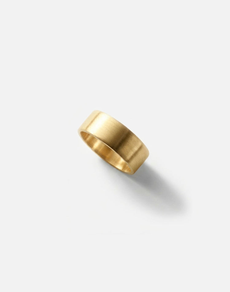 Men's gold round ring band. Modern minimalist jewelry men's and wome'ns made in Brooklyn New York by llayers.