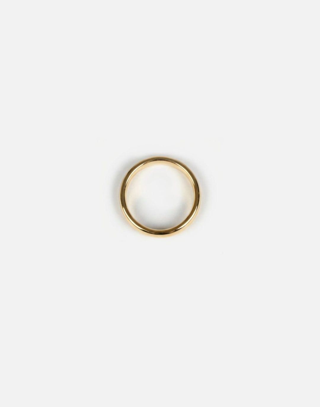 Women's gold round ring band. Modern minimalist jewelry men's and wome'ns made in Brooklyn New York by llayers.