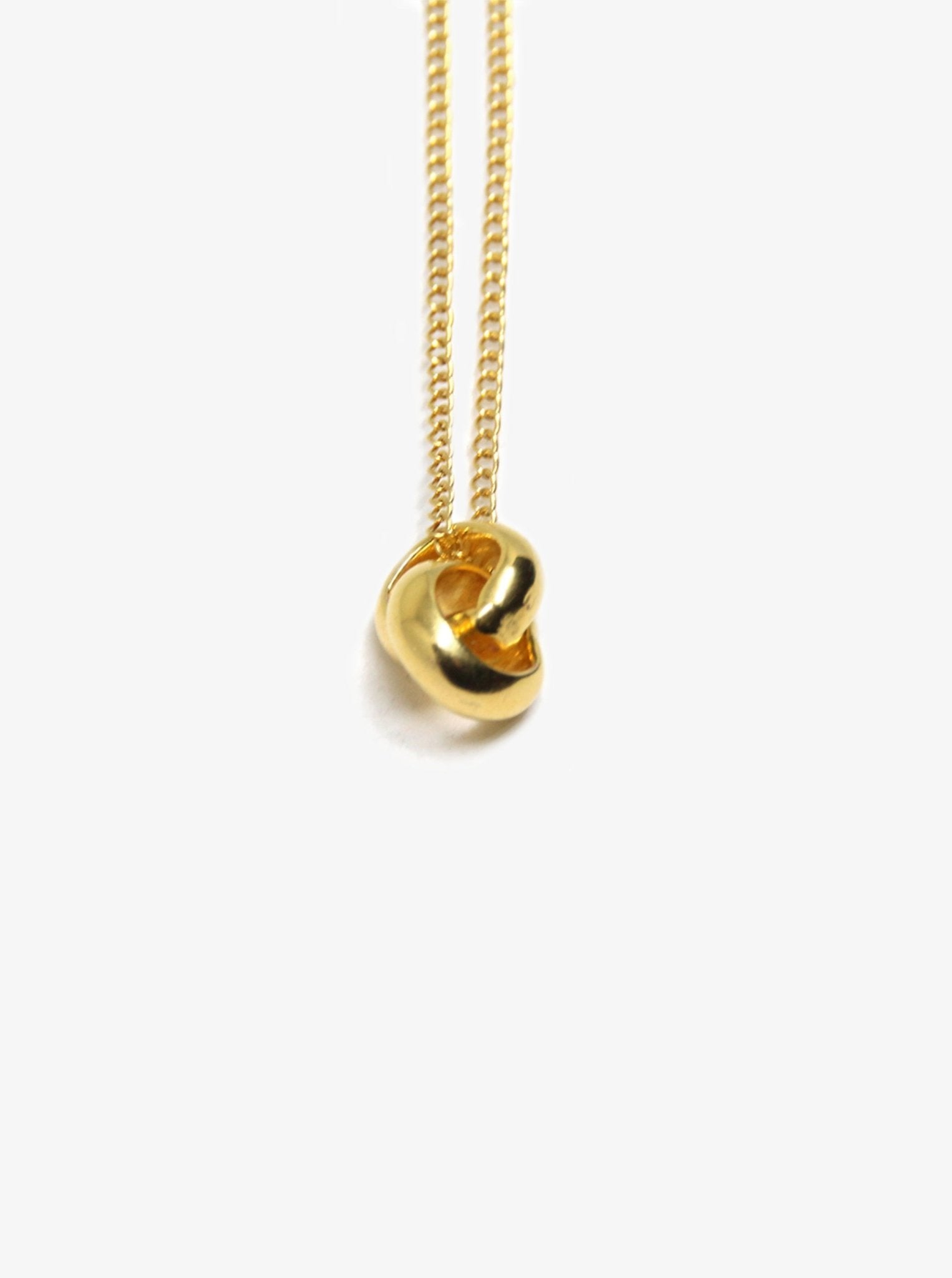 Women's Infinity gold loops chain necklace loops. Men's and women's minimal jewelry made in Brooklyn New York.