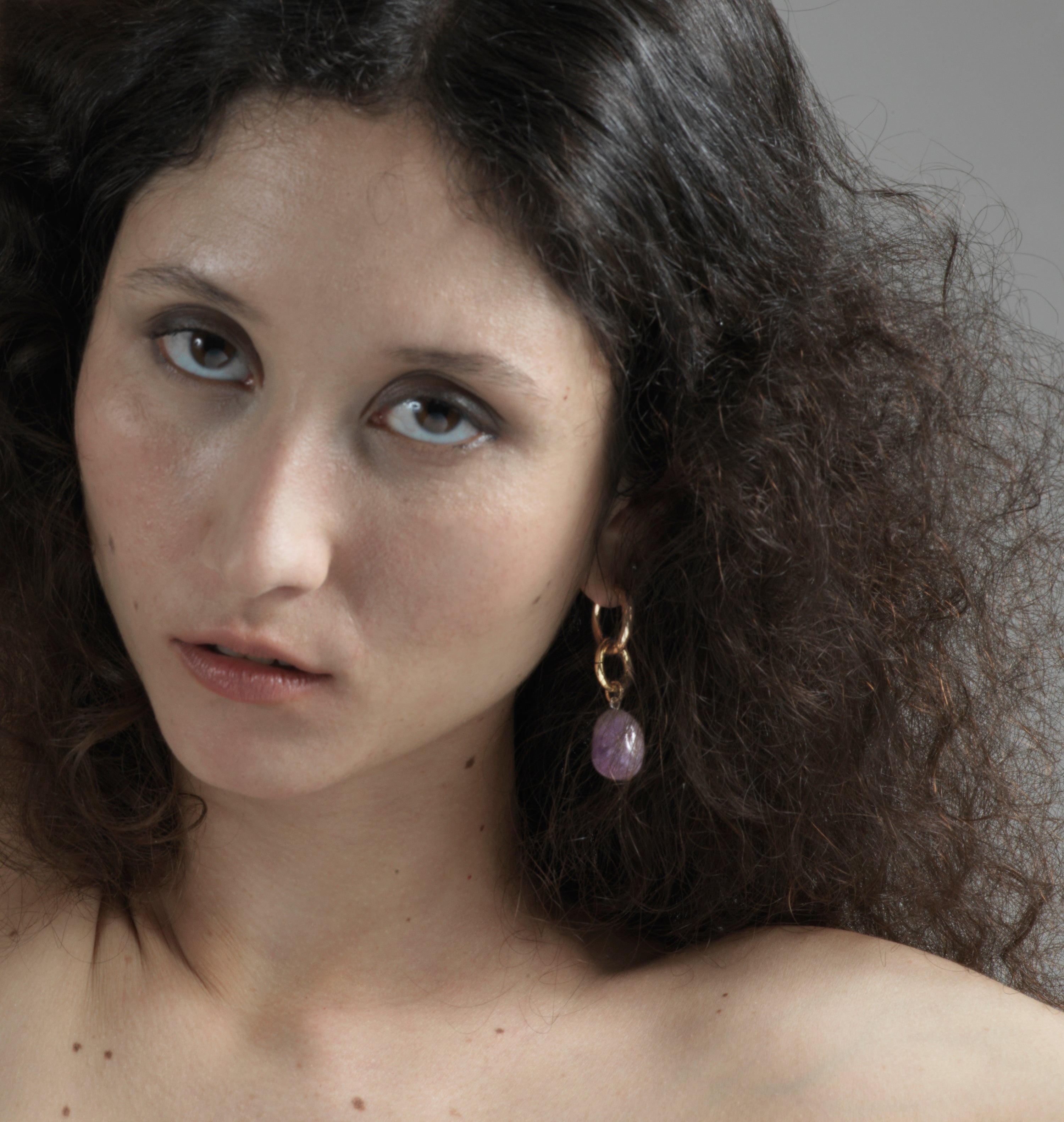 gold hoop with Amethyst stone earring in Brooklyn New York jewelry by llayers interchangeable men women Swing