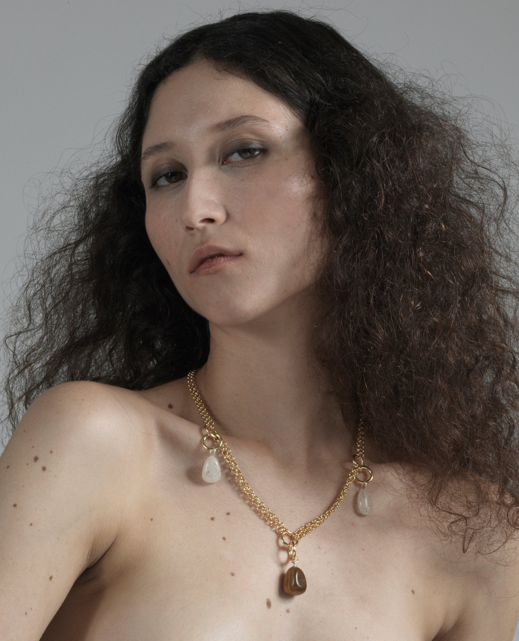 Crystals stone pendant necklace store in Brooklyn New York by by llayers