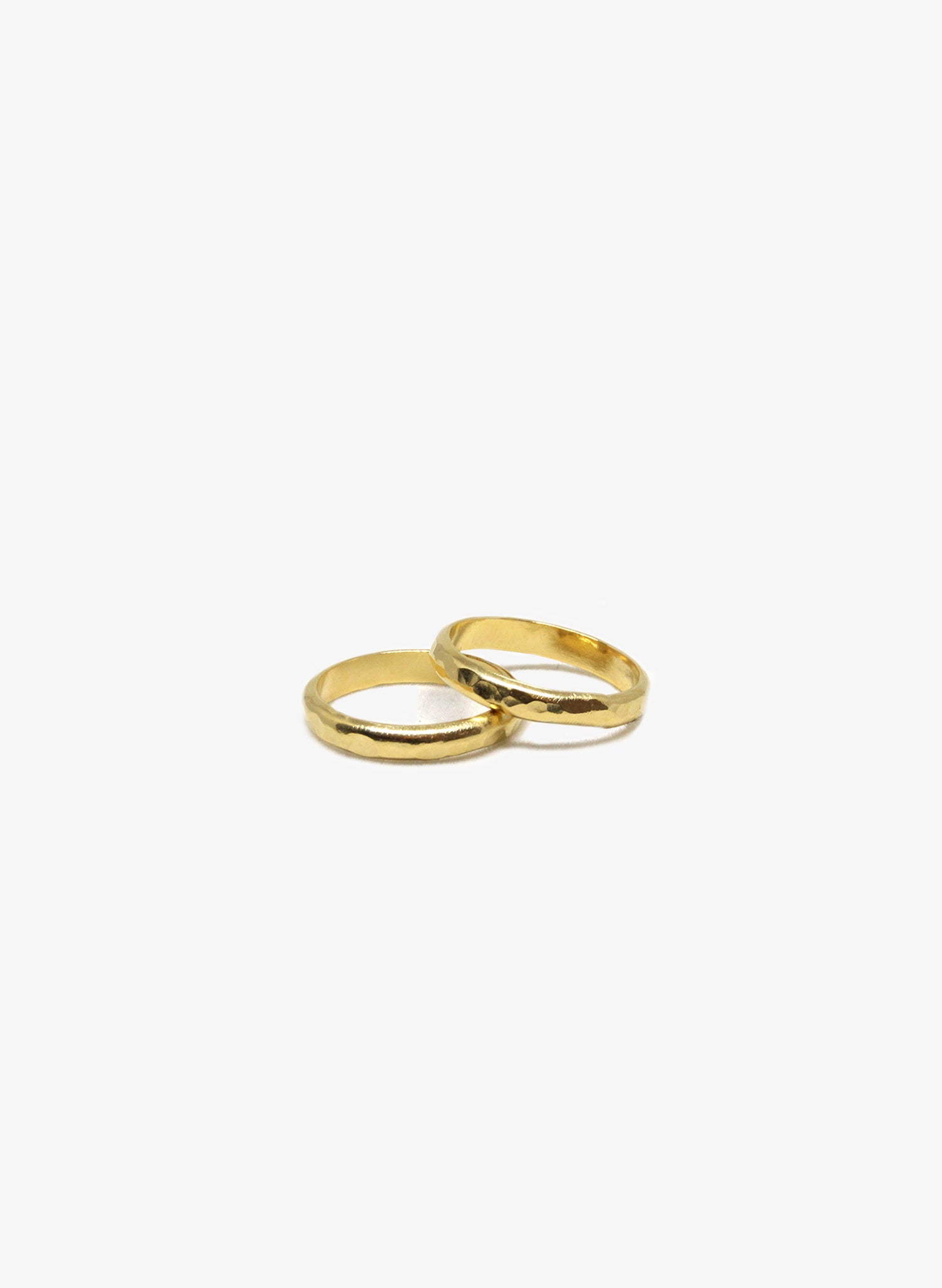 Gold hammered half round ring. Minimalist engagement rings in Brooklyn NewYork by designer llayers.