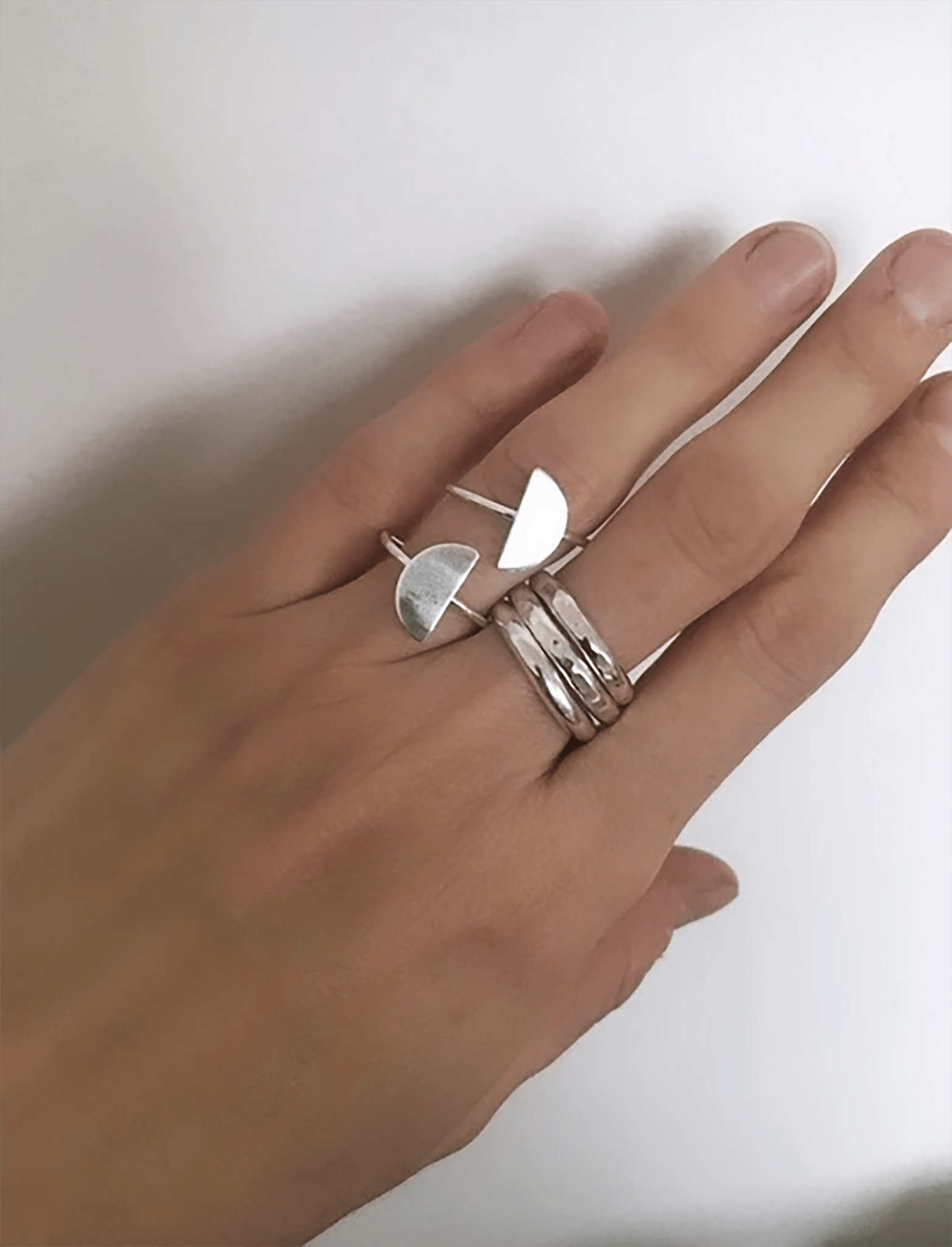 Silver hammered half round silver ring. Minimalist engagement rings in Brooklyn NewYork by designer llayers.