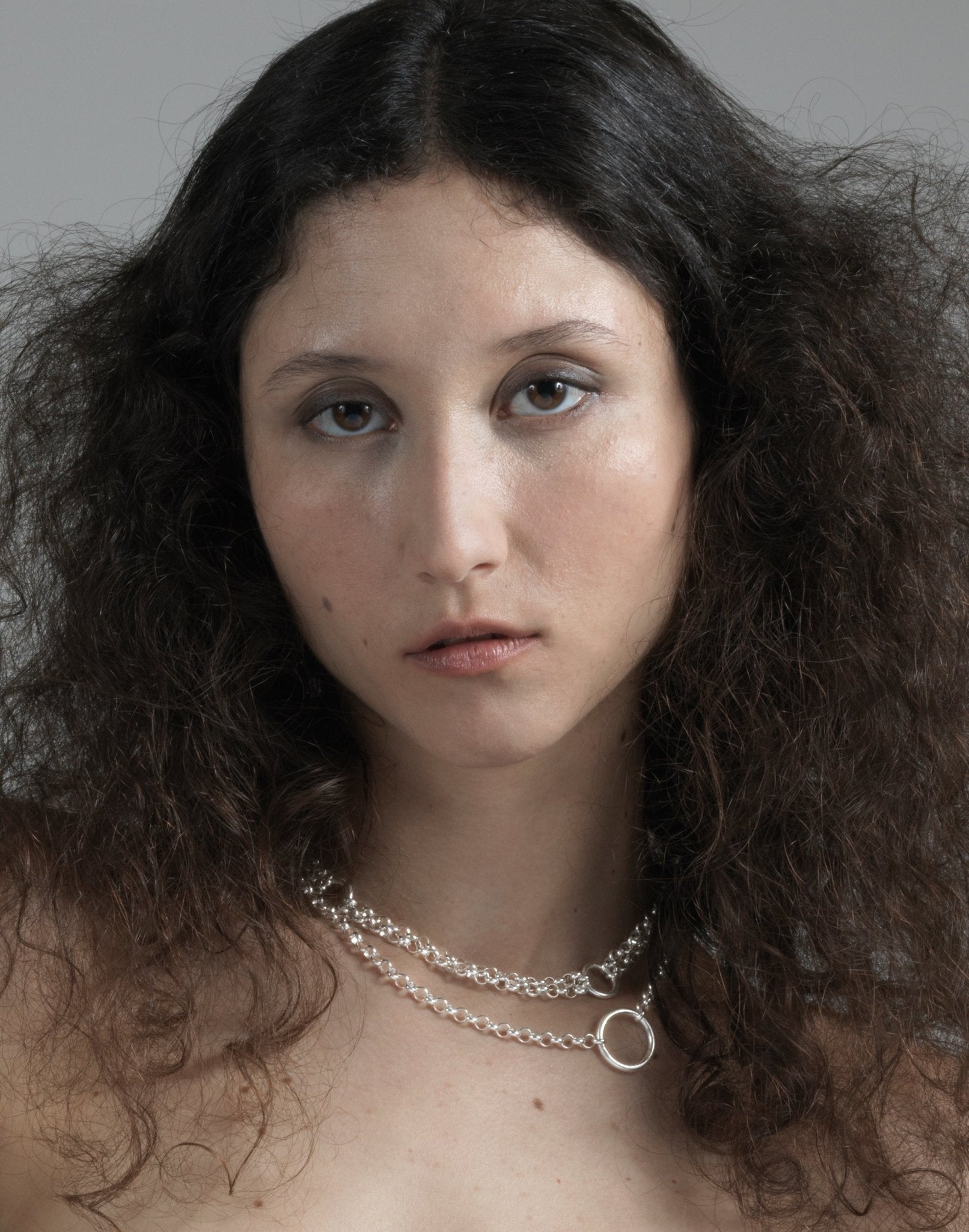 Sterling silver chain choker necklace with ring. Minimalist modern fashion jewelry in Brooklyn New York by designer llayers.