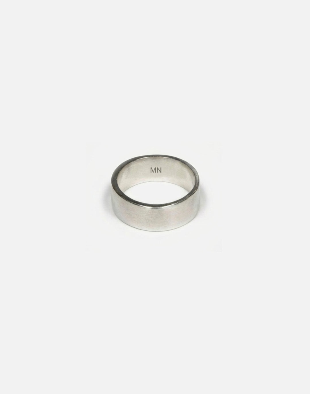 Mens' sterling silver engraved round ring band. Minimalist jewelry made in Brooklyn New York by llayers.