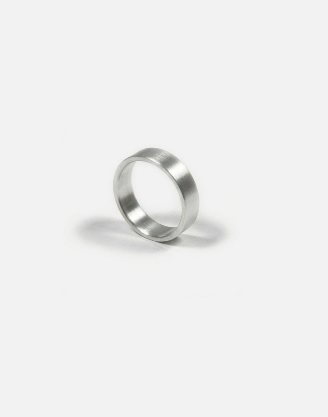 Men's sterling silver 6mm engraved ring band. Modern minimalist jewelry made in Brooklyn New York by llayers.