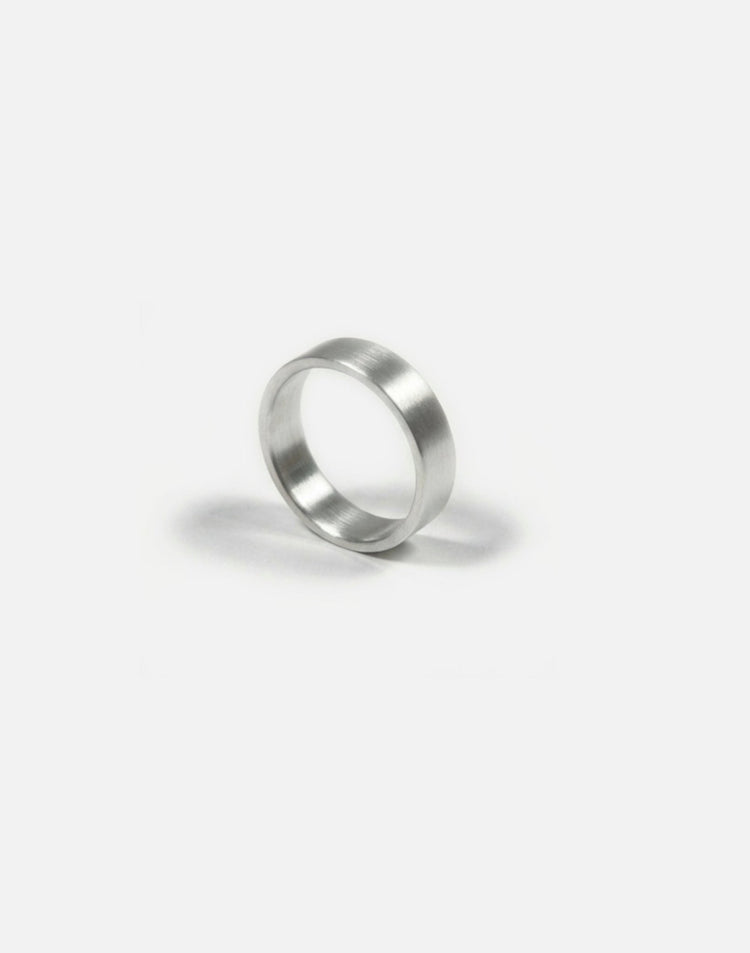 Men's sterling silver 6mm engraved ring band. Modern minimalist jewelry made in Brooklyn New York by llayers.