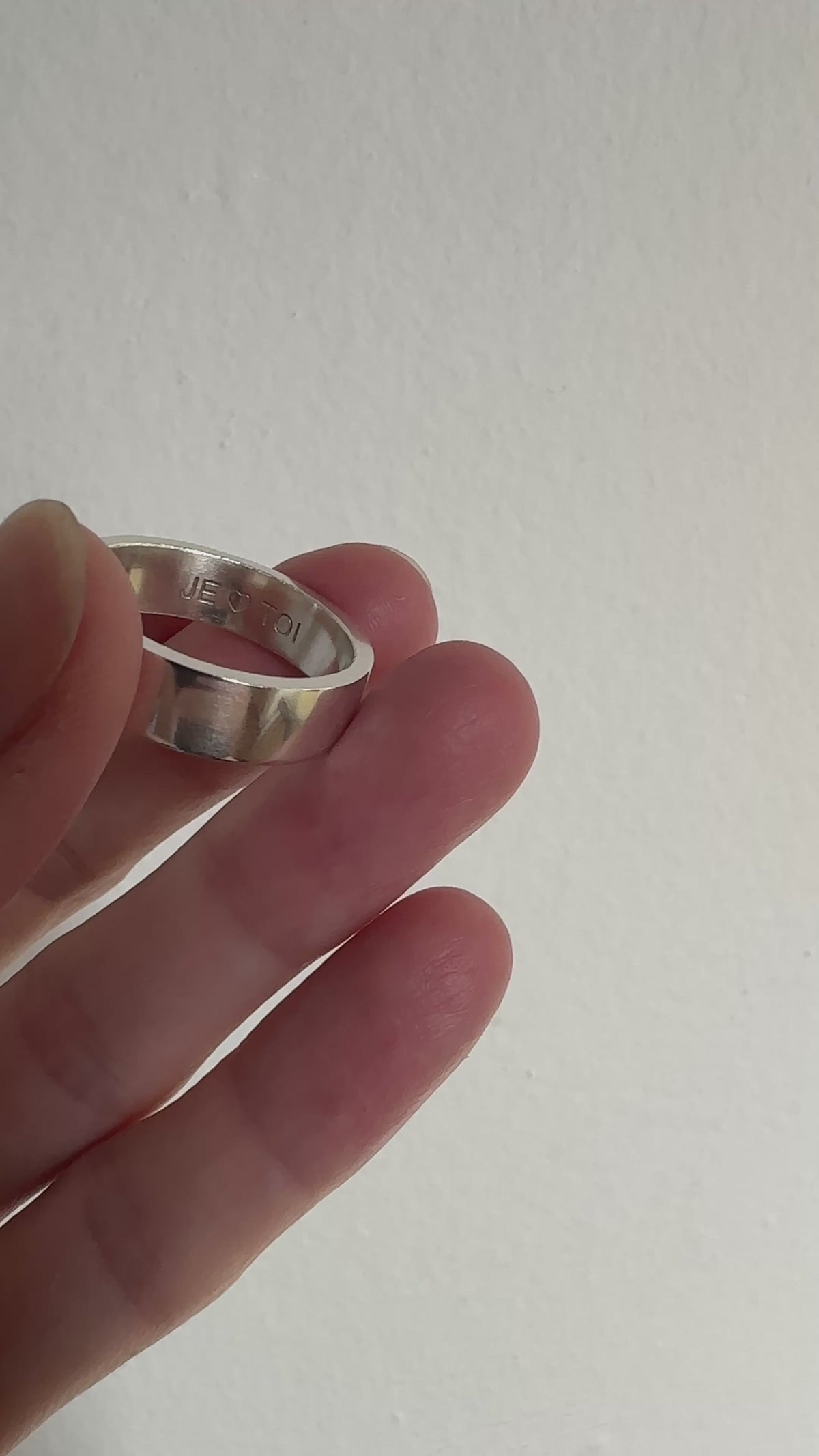 Womens' men's sterling silver engraved round ring band. Minimalist jewelry made in Brooklyn New York by llayers.