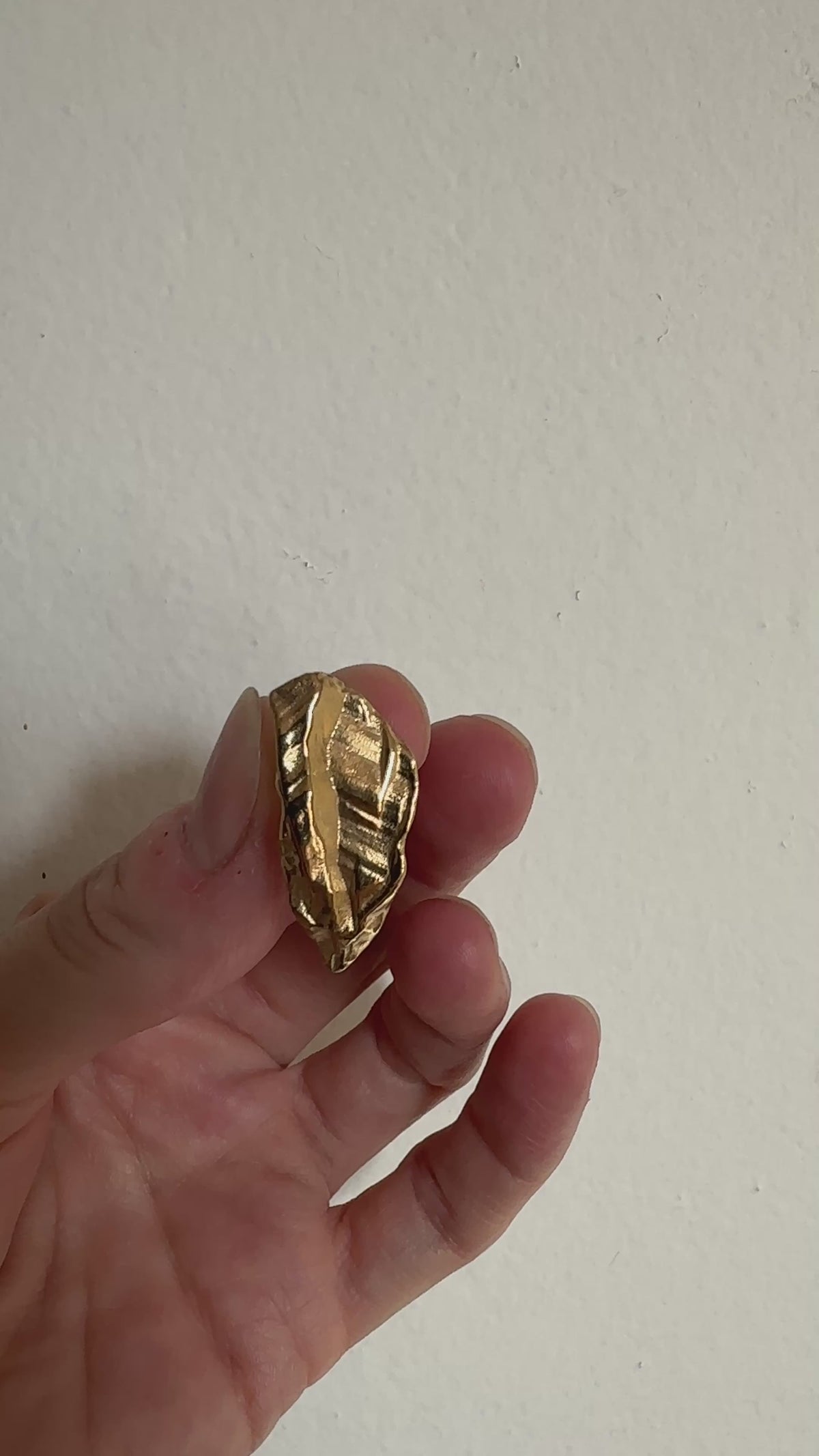 gold plated sculptural stud earrings. Layered rock formations. Made in new york by llayers.