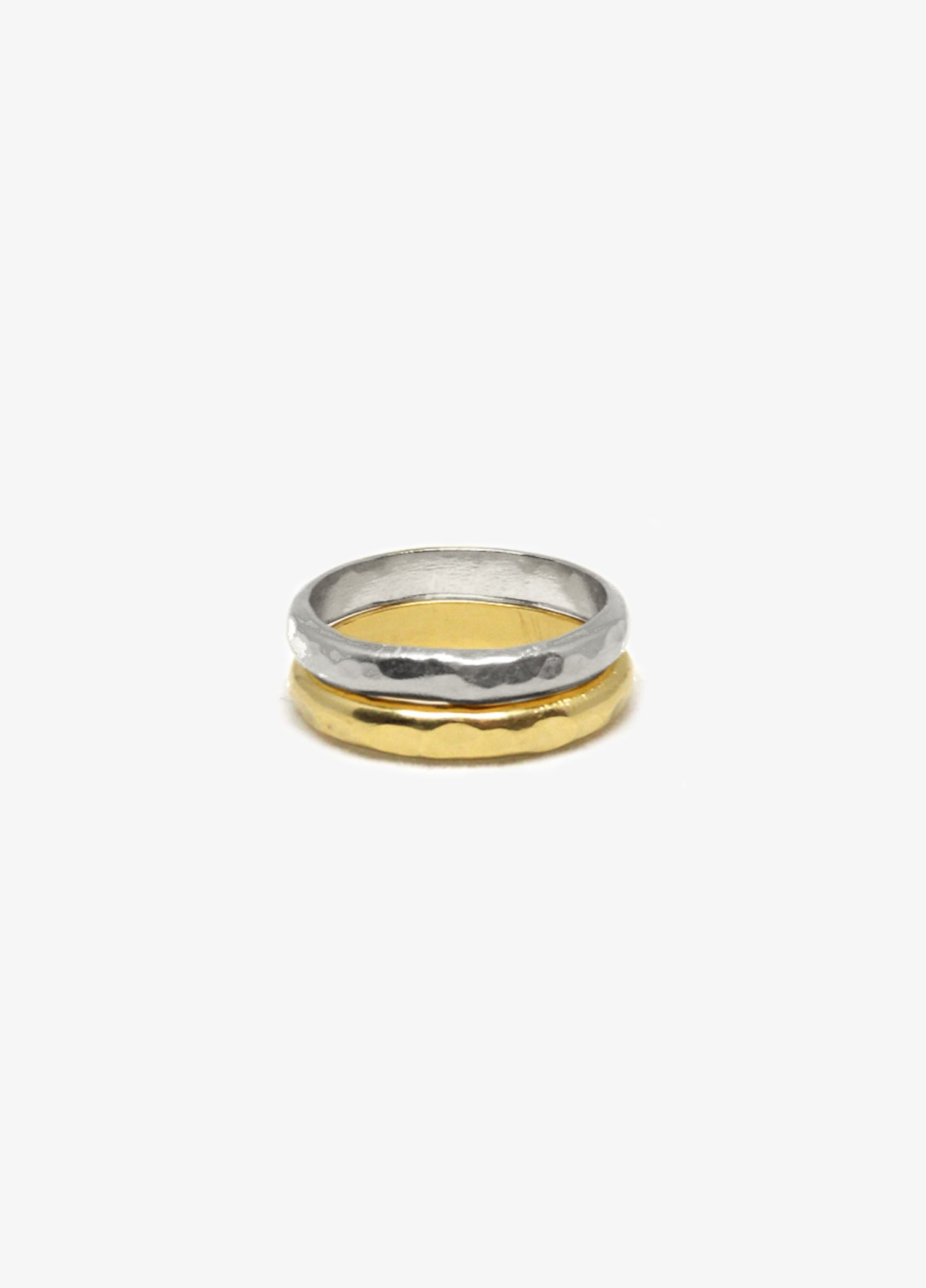 Minimalist silver hammered round ring. Minimalist engagement rings in Brooklyn New York by designer llayers.