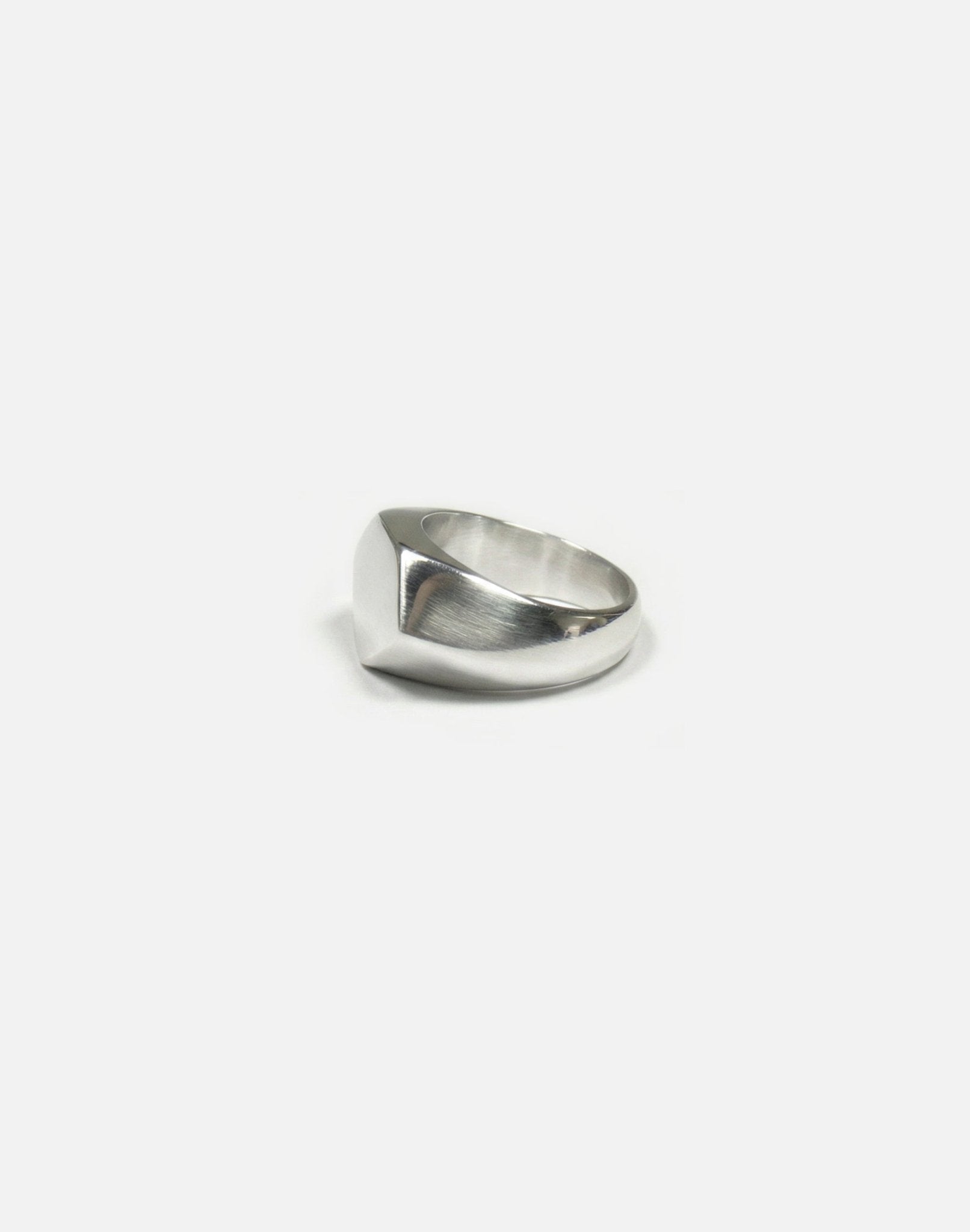 minimalist silver hexagonal signet ring in New York by llayers