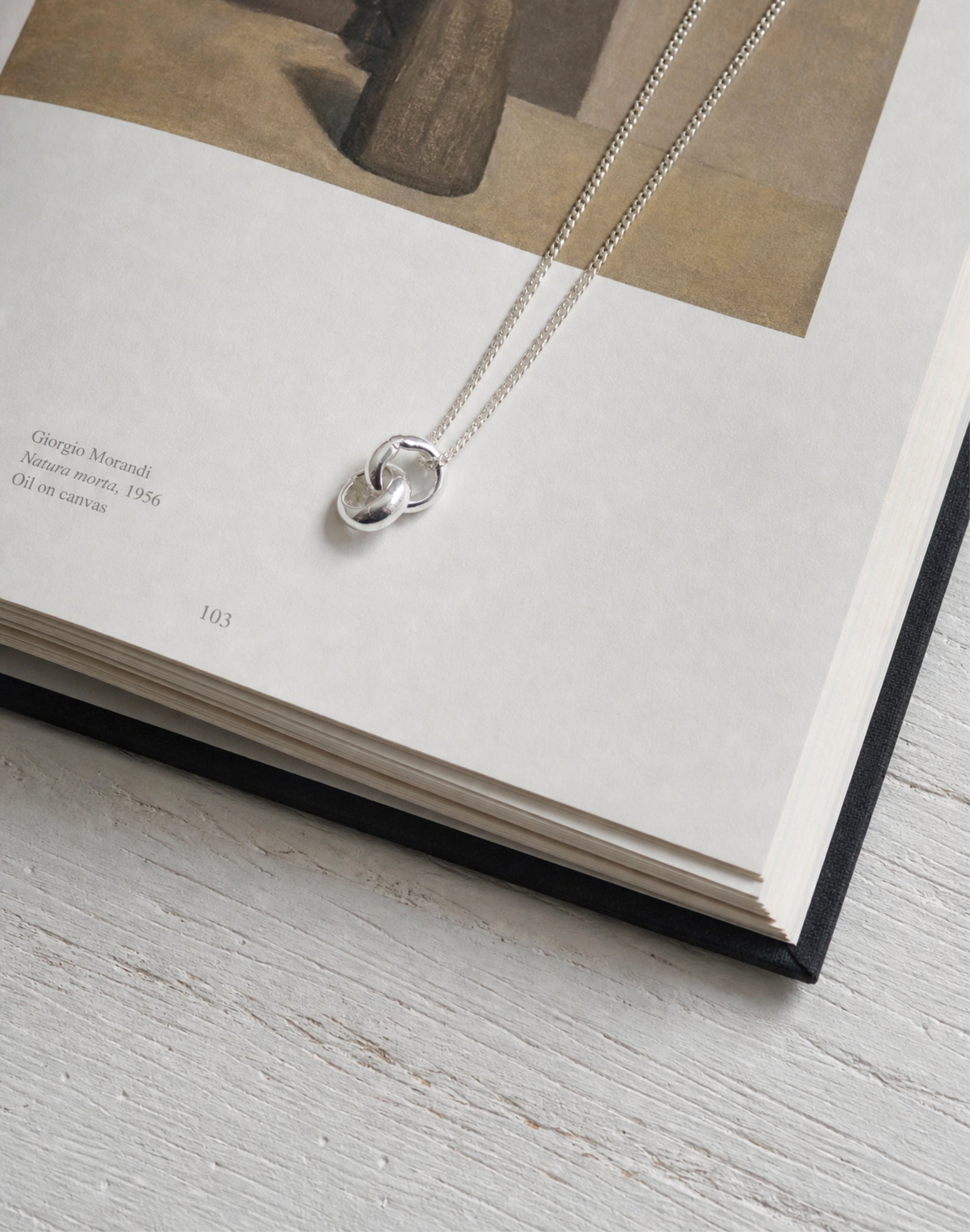 Infinity silver loops necklace. Men's and women's minimal jewelry made in Brooklyn New York.