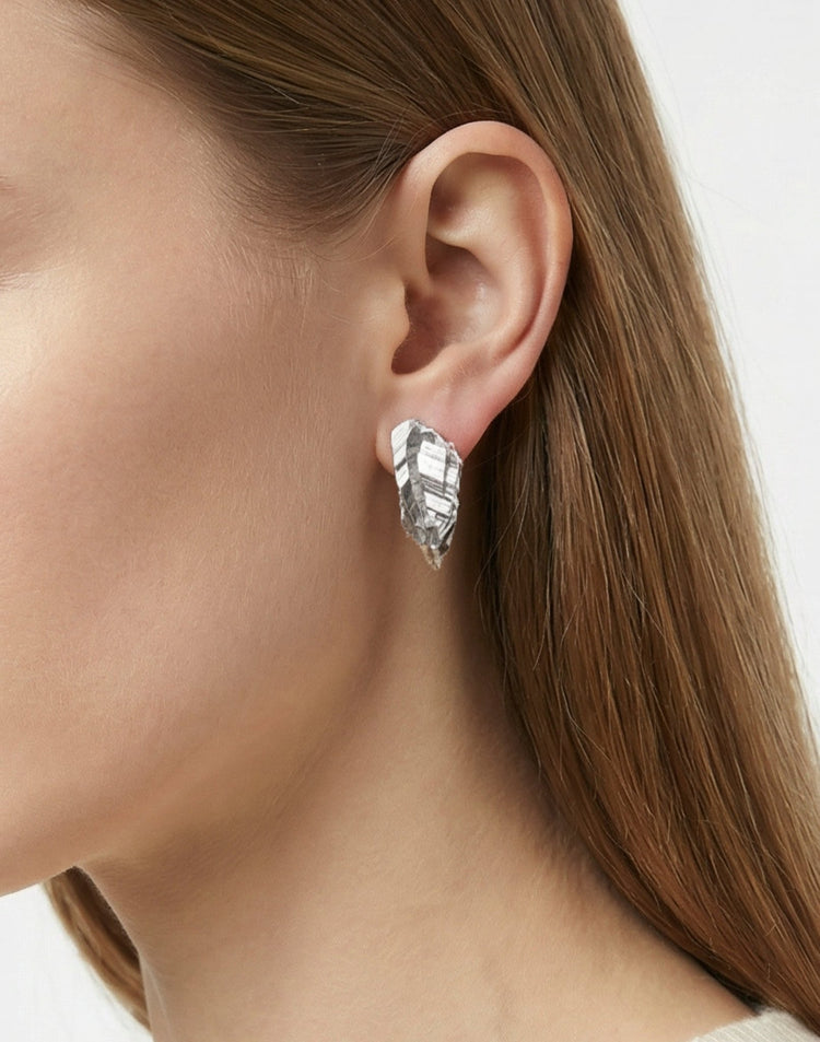 sterling silver sculptural stud earrings. Layered rock formations.Made in new york by llayers.
