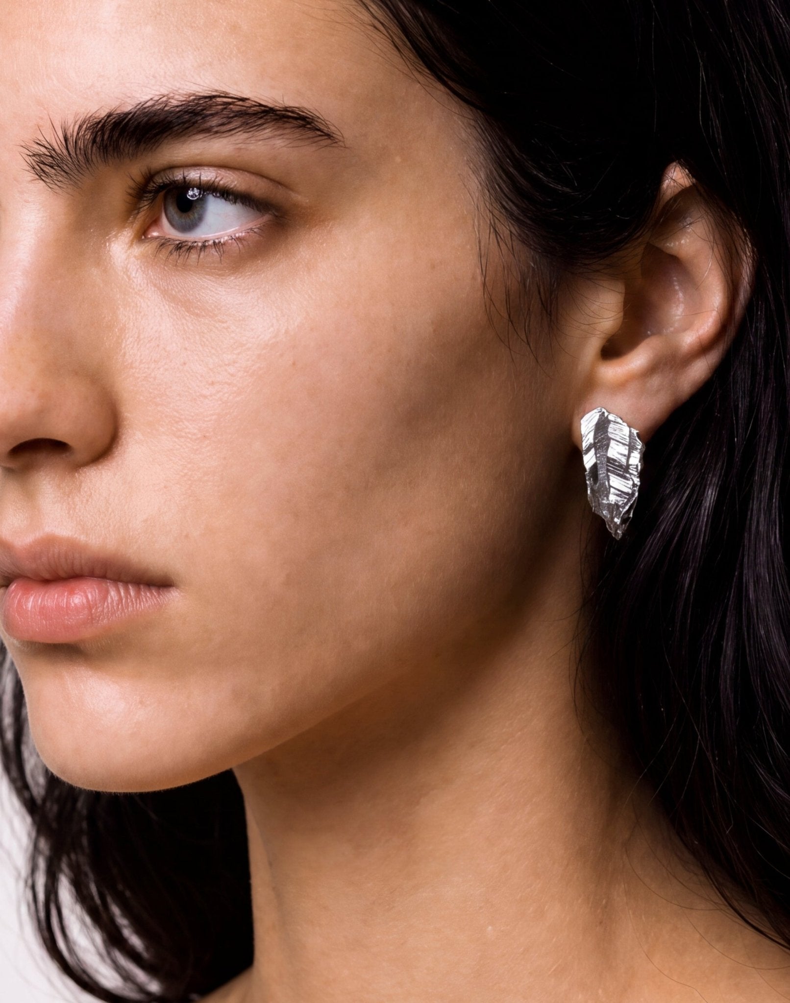 sterling silver sculptural stud earrings. Layered rock formations.Made in new york by llayers.