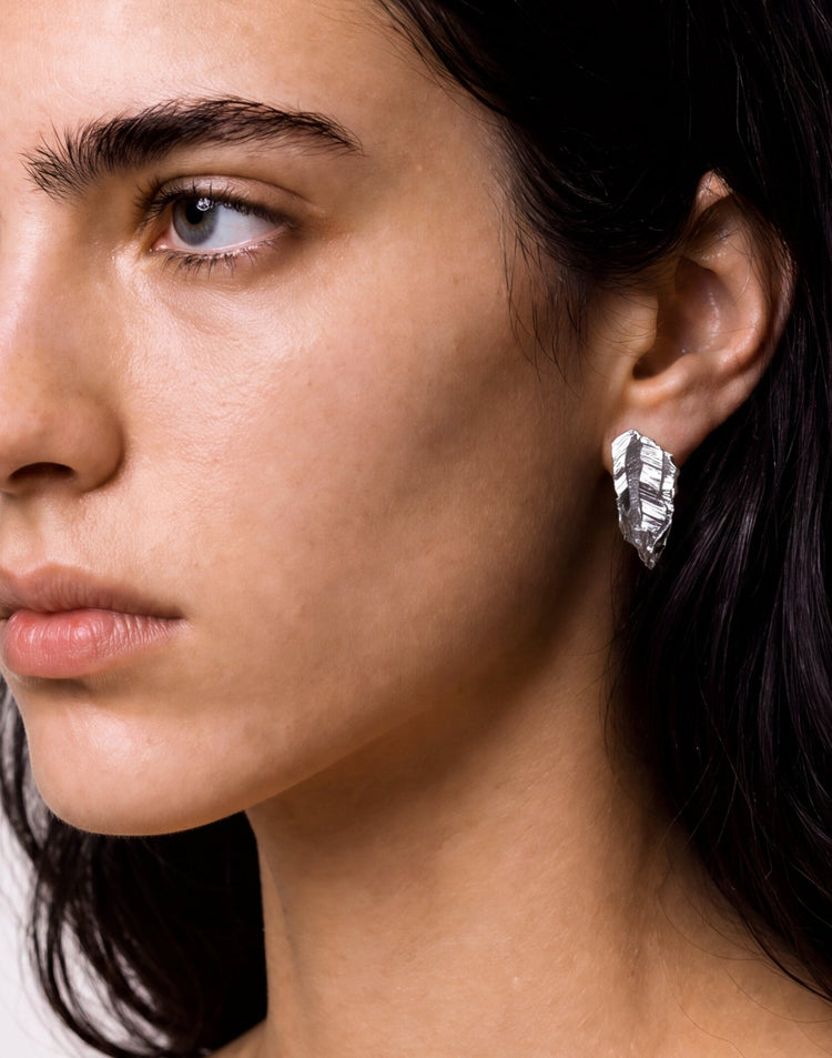 sterling silver sculptural stud earrings. Layered rock formations.Made in new york by llayers.