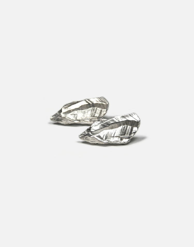 sterling silver sculptural stud earrings. Layered rock formations.Made in new york by llayers.