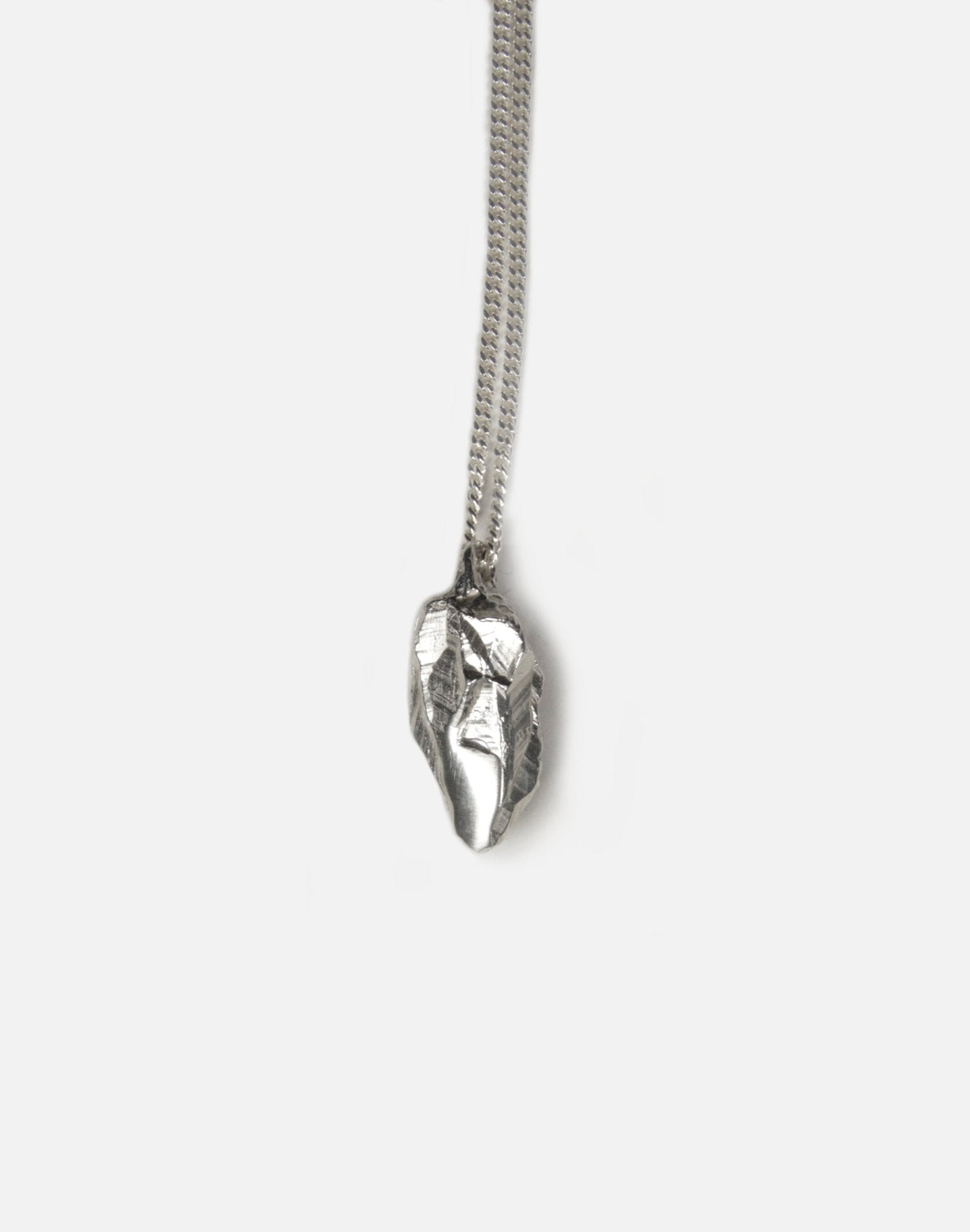 silver sculptural rock pendant necklace in new york by llayers 