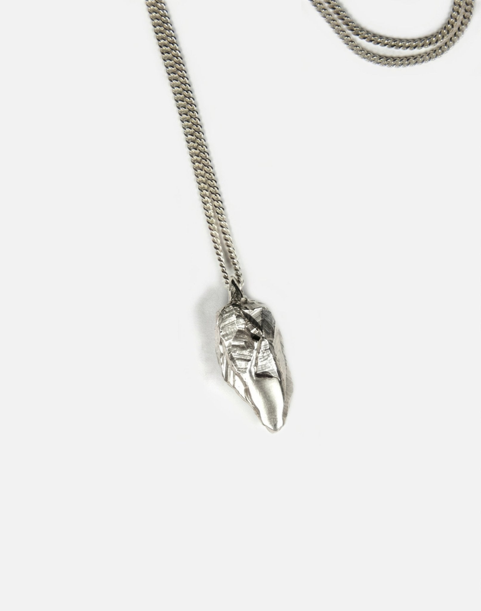 silver sculptural rock pendant necklace in new york by llayers 