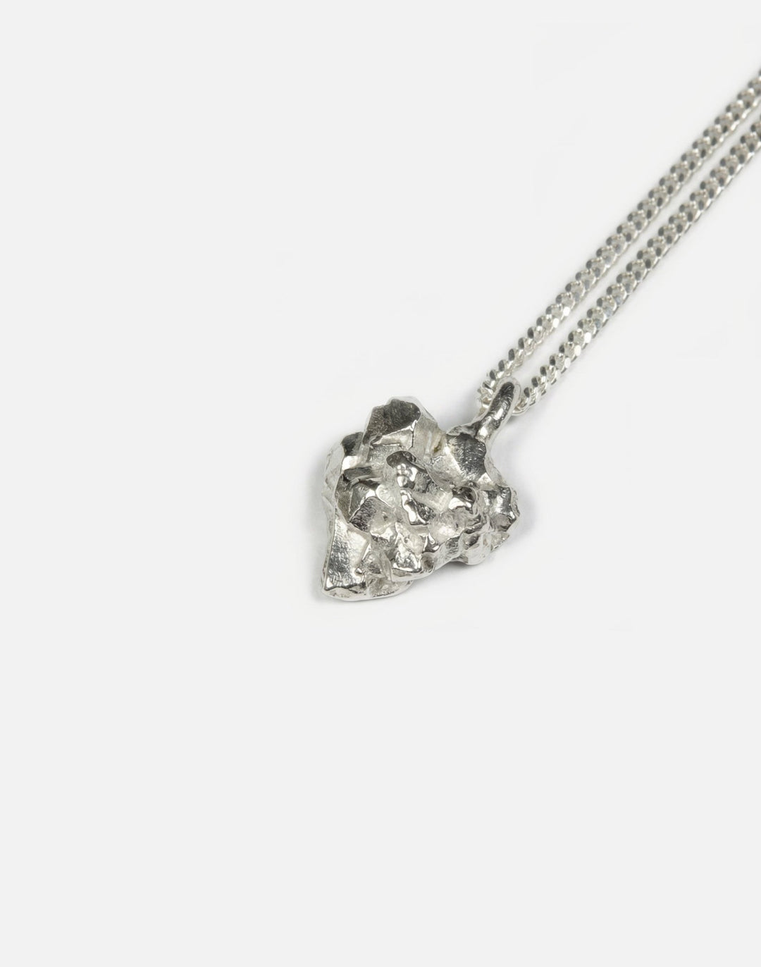 silver cluster sculptural rock pendant necklace in new york by llayers 