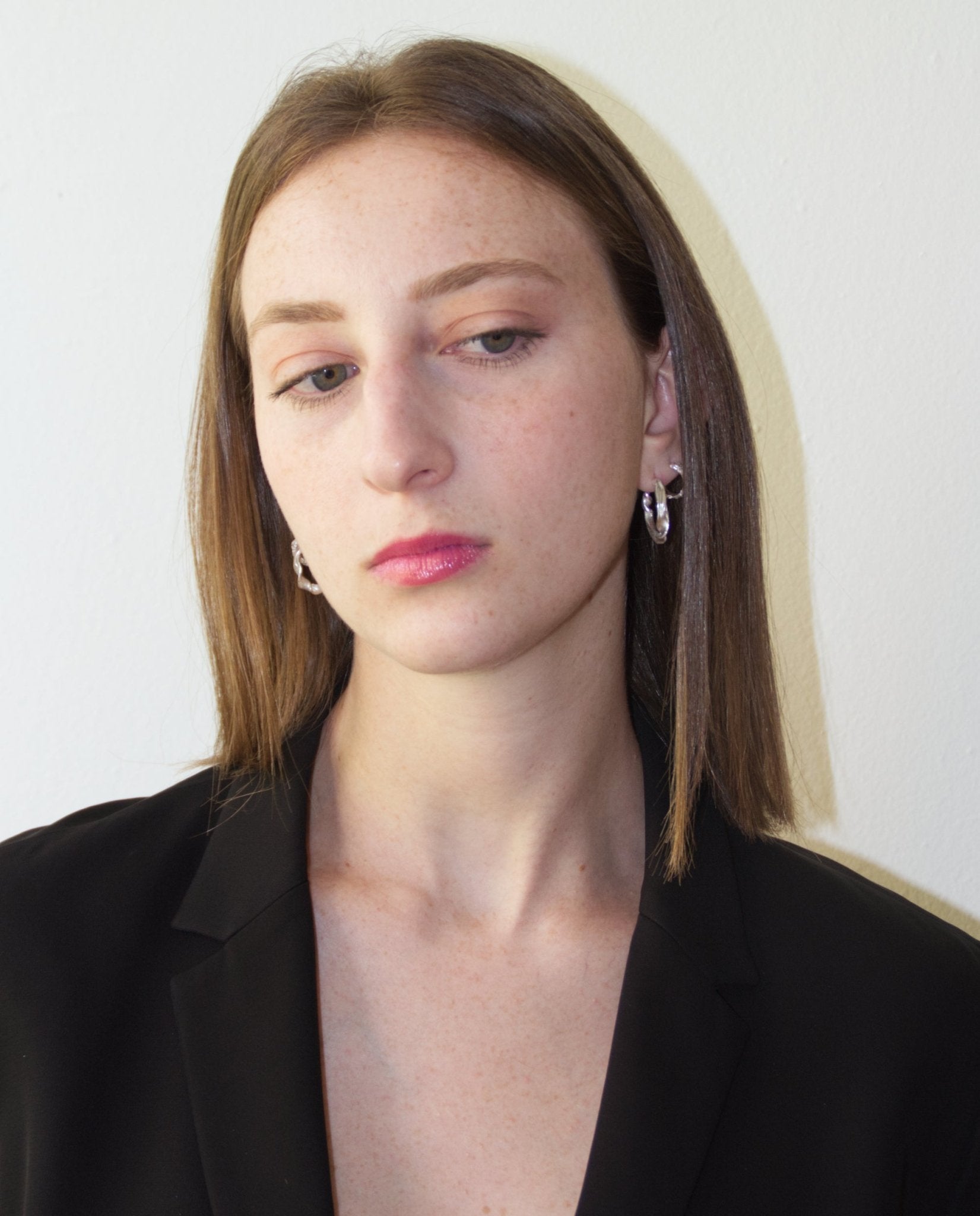 Sterling silver modern hoop earrings. Best affordable jewelry made in Brooklyn New York by llayers.