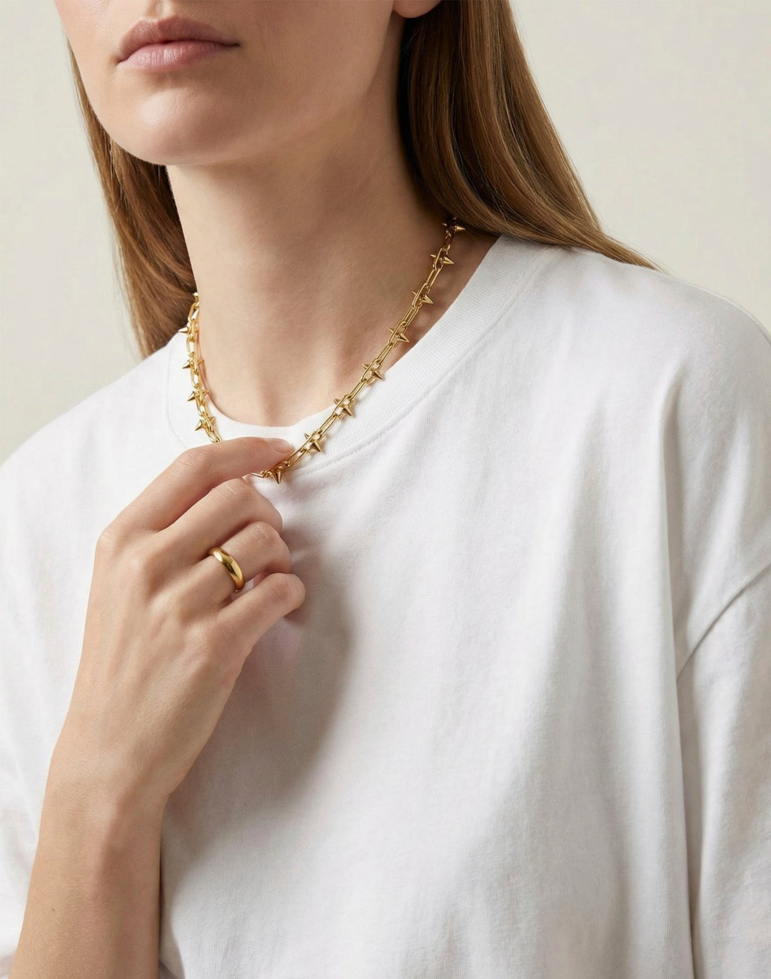 Women's small spike gold brass chain necklace. Modern unisex jewelry handmade in Brooklyn, New York by llayers.