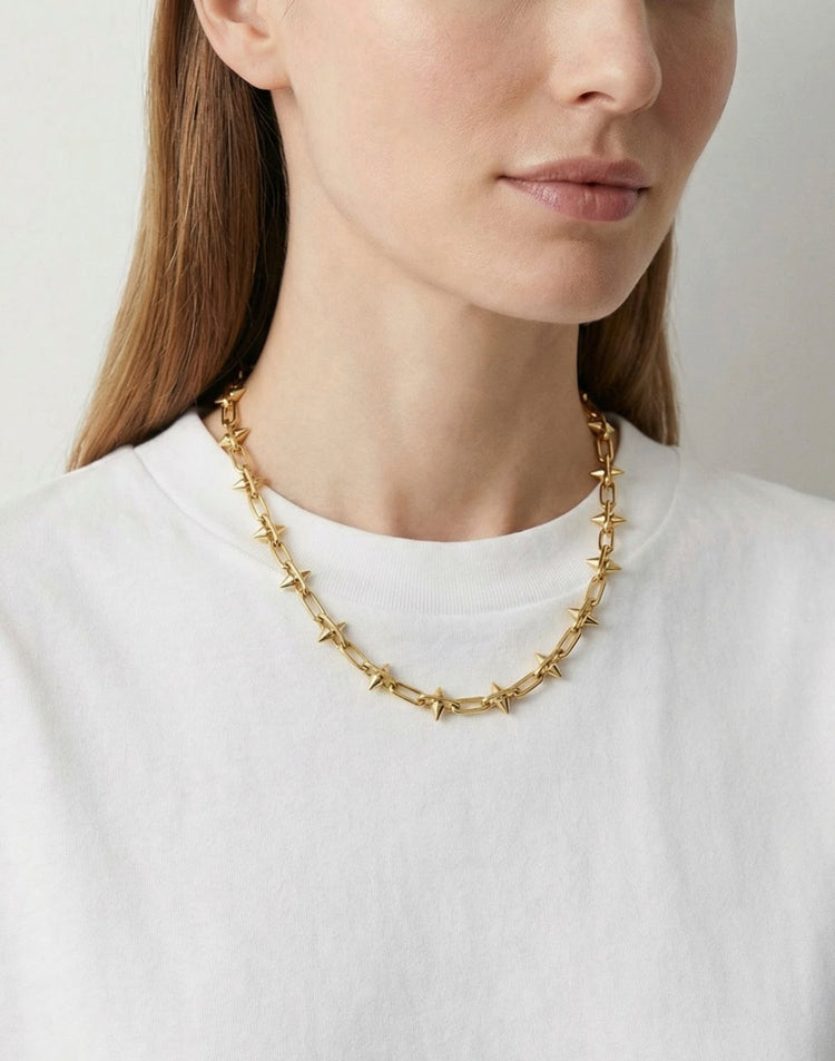 Women's small spike gold brass chain necklace. Modern unisex jewelry handmade in Brooklyn, New York by llayers.
