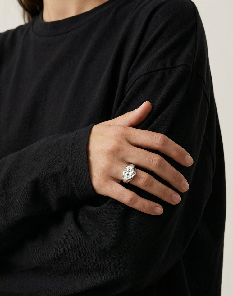 designer silver hexagonal signet ring molten inspired texture. Made in New York by llayers.
