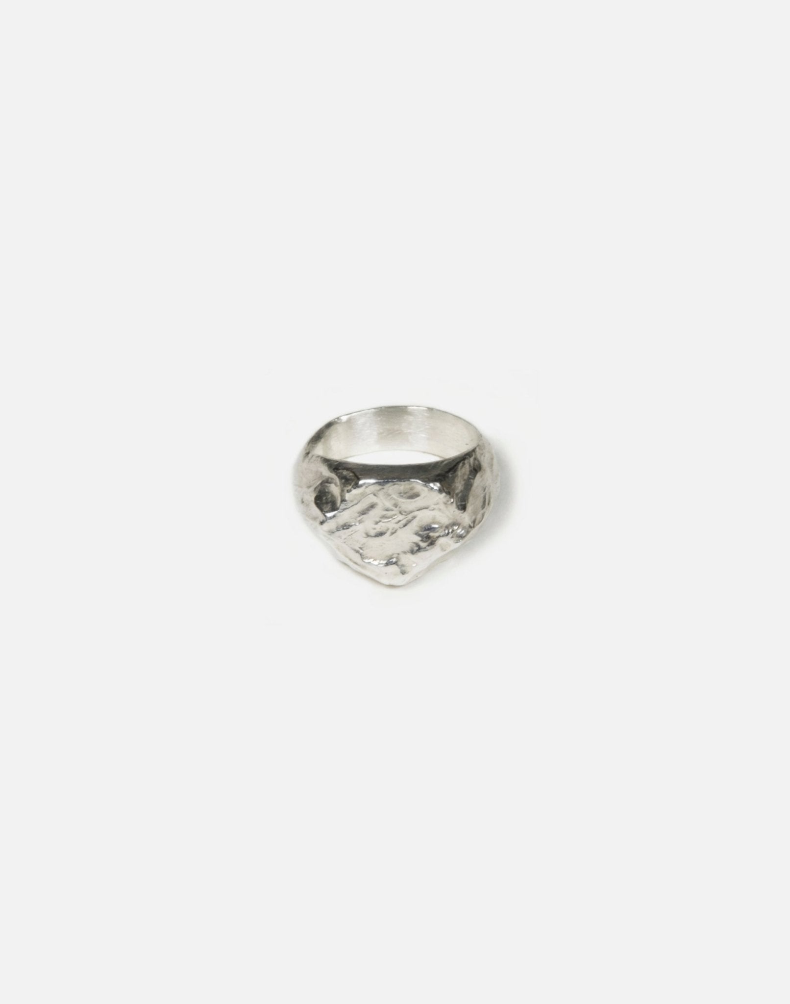 silver hexagonal signet ring molten inspired texture. Made in New York by llayers.