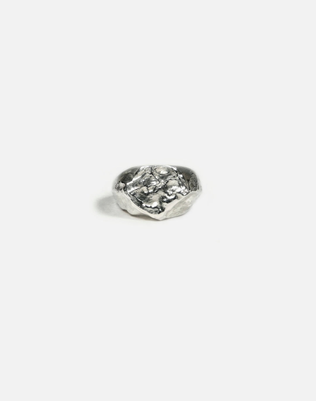designer silver hexagonal signet ring molten inspired texture. Made in New York by llayers.