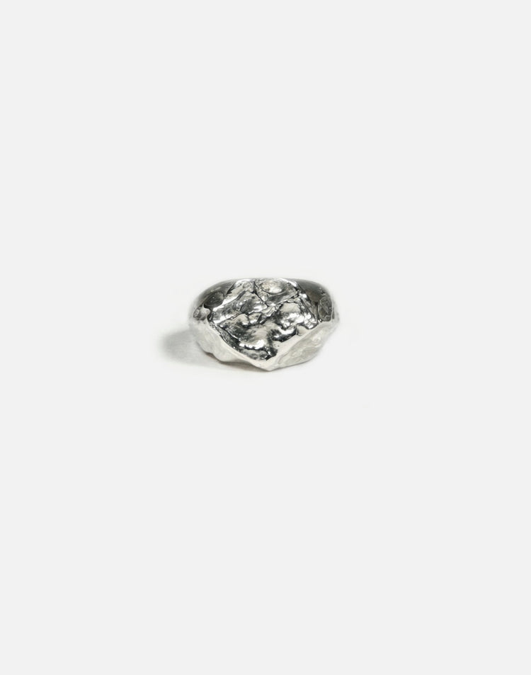 designer silver hexagonal signet ring molten inspired texture. Made in New York by llayers.