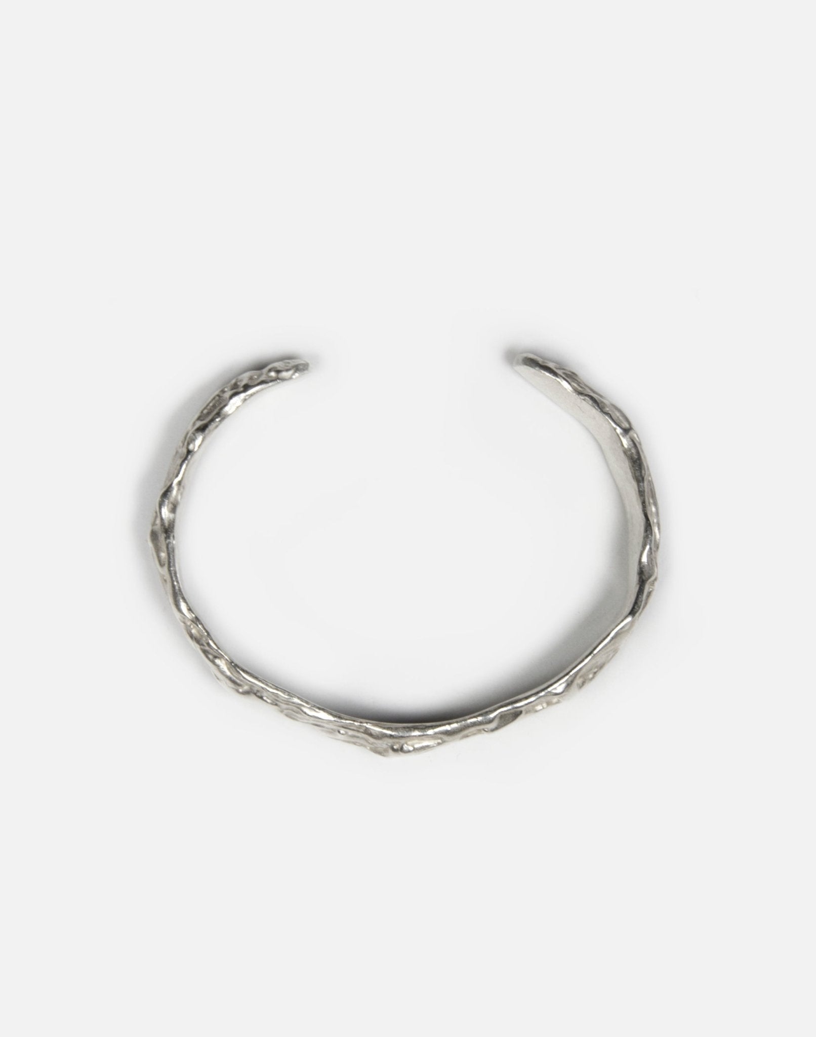 Sterling silver sculptural molten cuff bracelet in Brooklyn New York