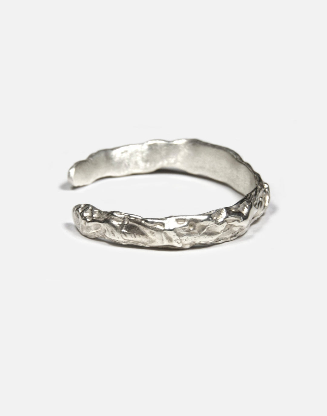 minimalist sterling silver sculptural molten cuff bracelet in New York