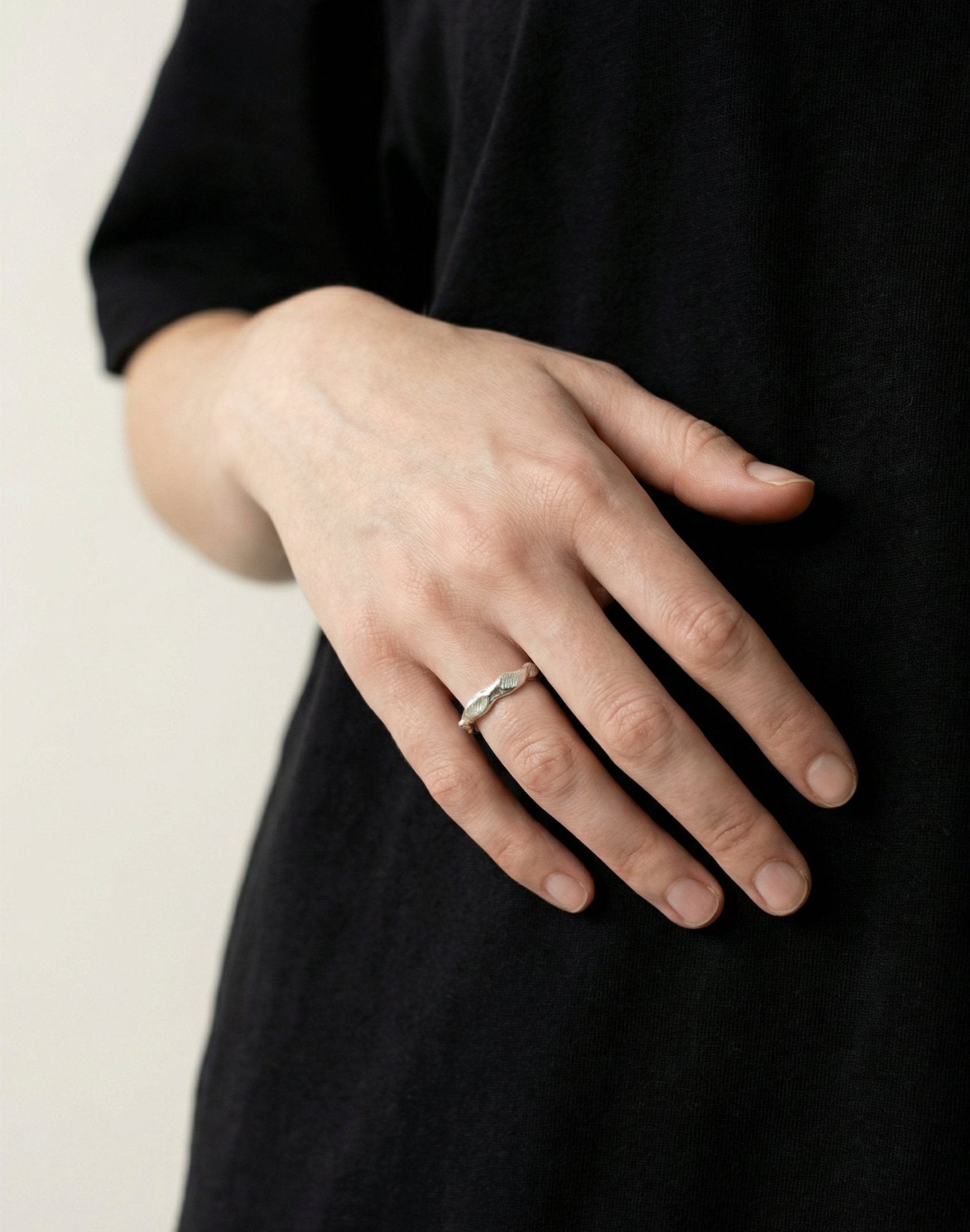 sterling silver thin textured molten ring crafted in new york lava by llayers