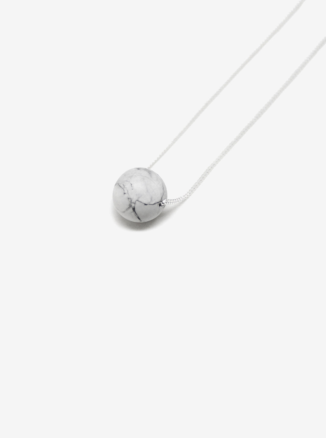 stone pendant orbit made in new york brookyln by llayers jewelry silver marble howlite 