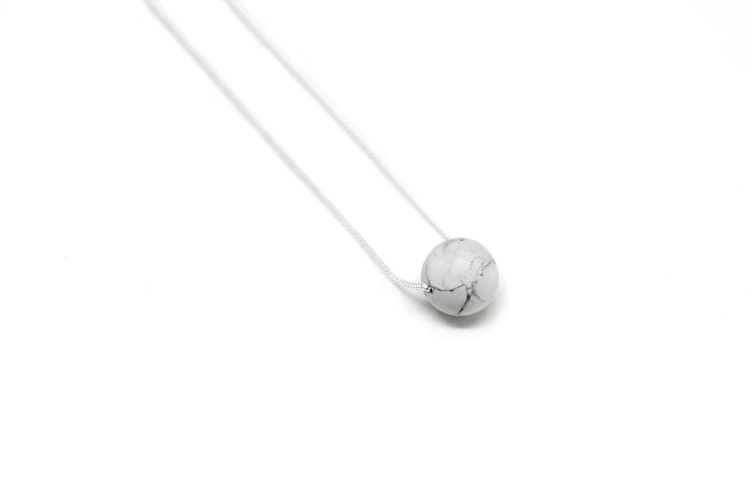 stone pendant orbit made in new york brookyln by llayers jewelry silver marble howlite 