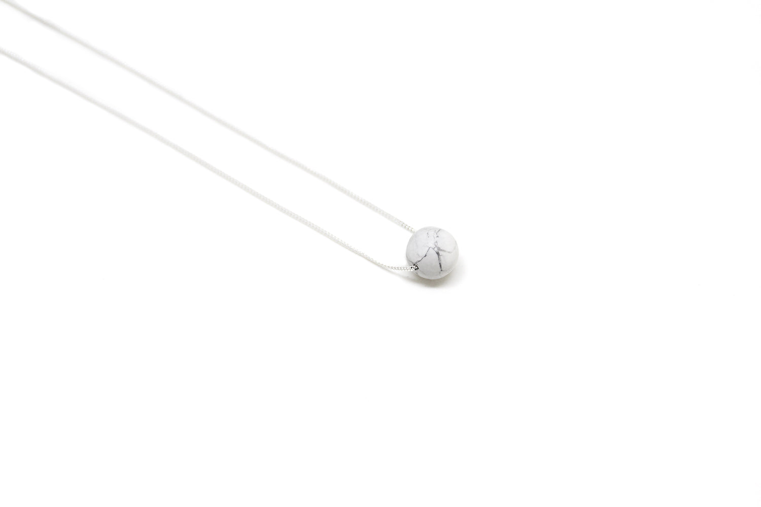 stone pendant orbit made in new york brookyln by llayers jewelry silver marble howlite 