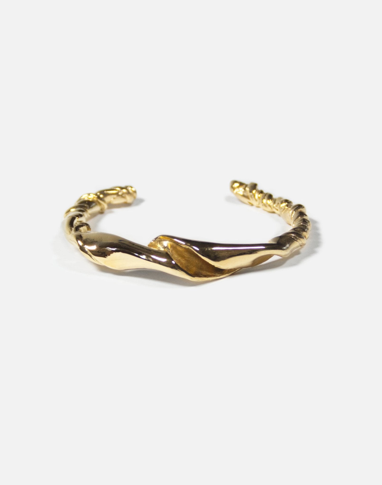 Gold twisted cuff bracelet. Minimalist and modern jewelry made in Brooklyn New York by llayers.