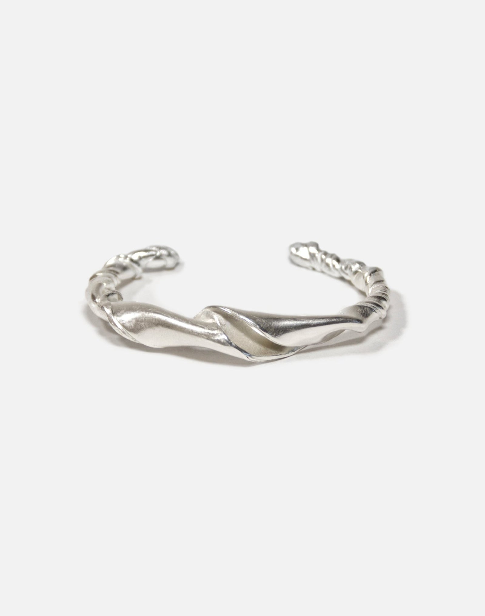 Silver twisted cuff bracelet. Minimalist and modern jewelry made in Brooklyn New York by llayers.