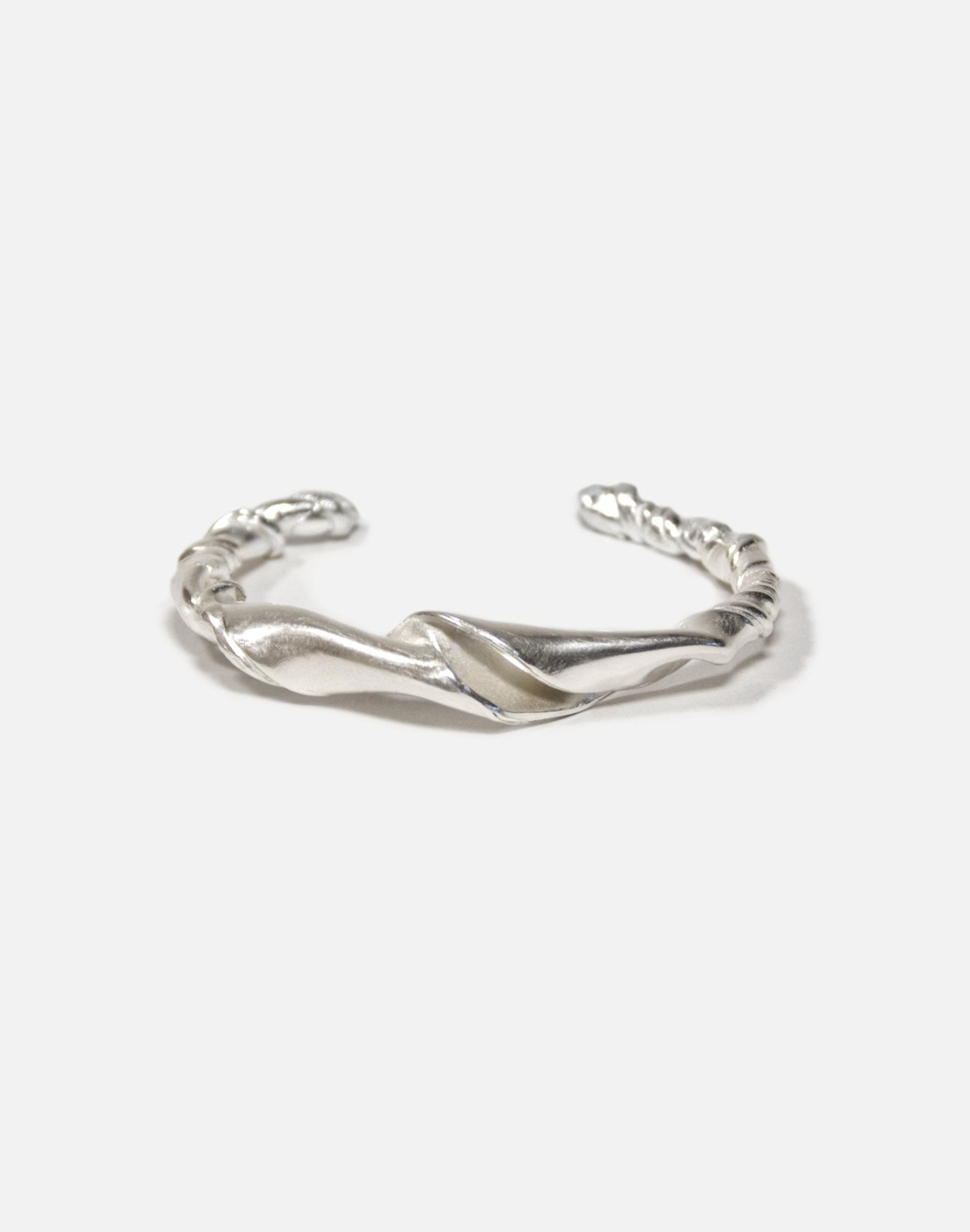 Silver twisted cuff bracelet. Minimalist and modern jewelry made in Brooklyn New York by llayers.