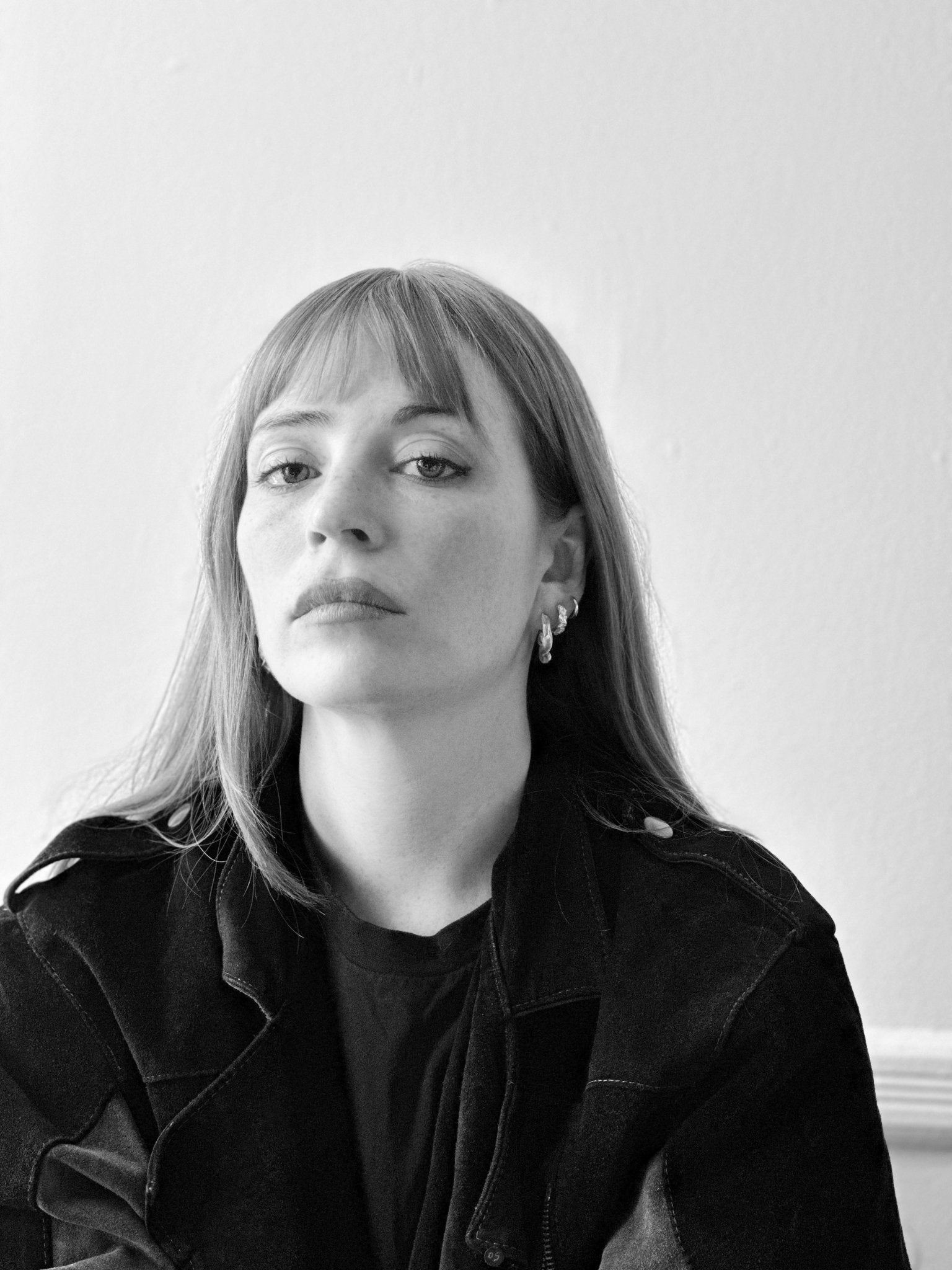 Women Gold textured hoop earrings granite. Emerging designer. Minimalist jewelry made in Brooklyn New York by llayers.
