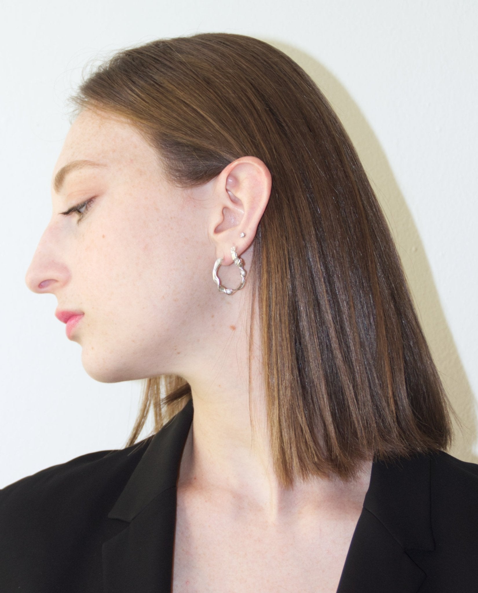 Sterling silver modern hoop earrings. Best affordable jewelry made in Brooklyn New York by llayers.
